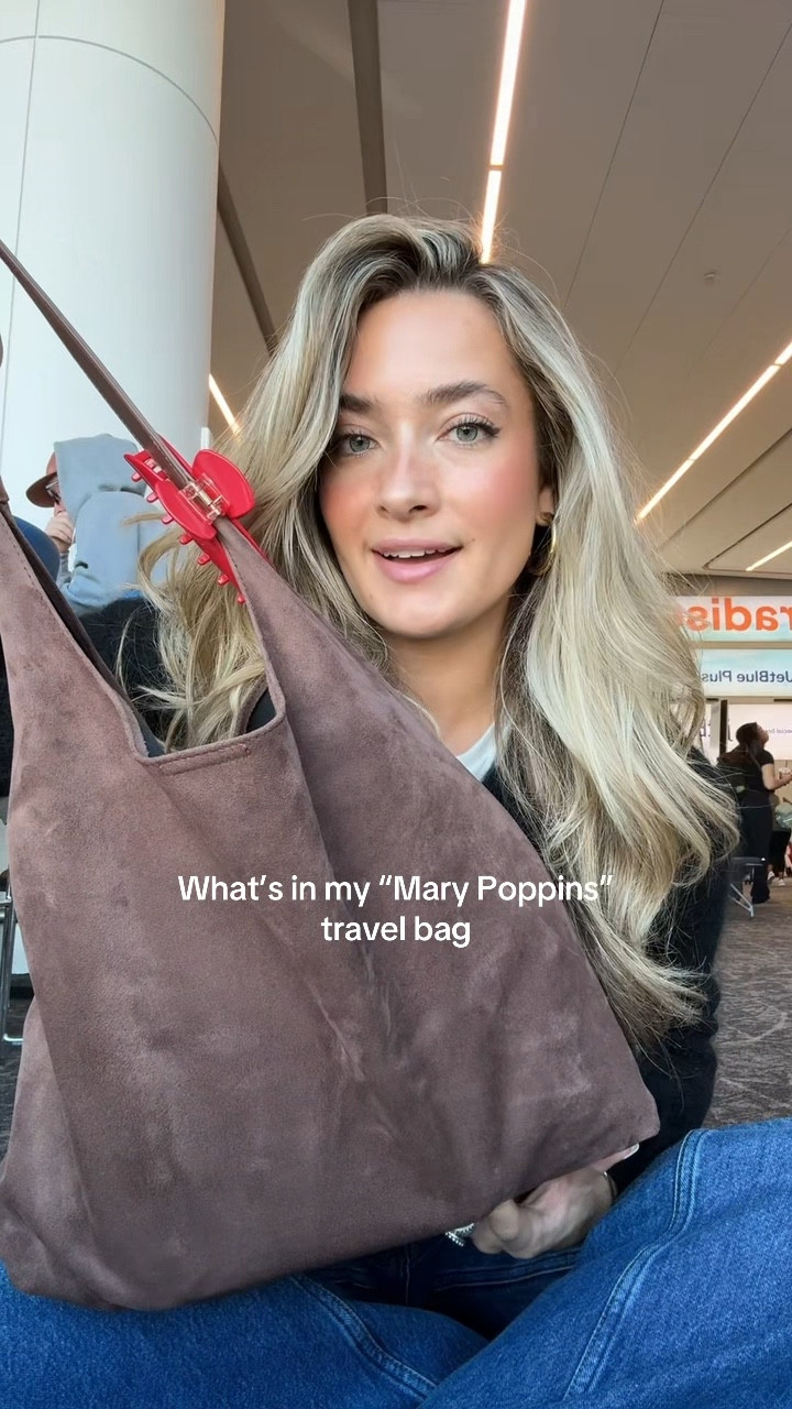 My “Mary poppins” travel bag that fits everything! The perfect small carry on 