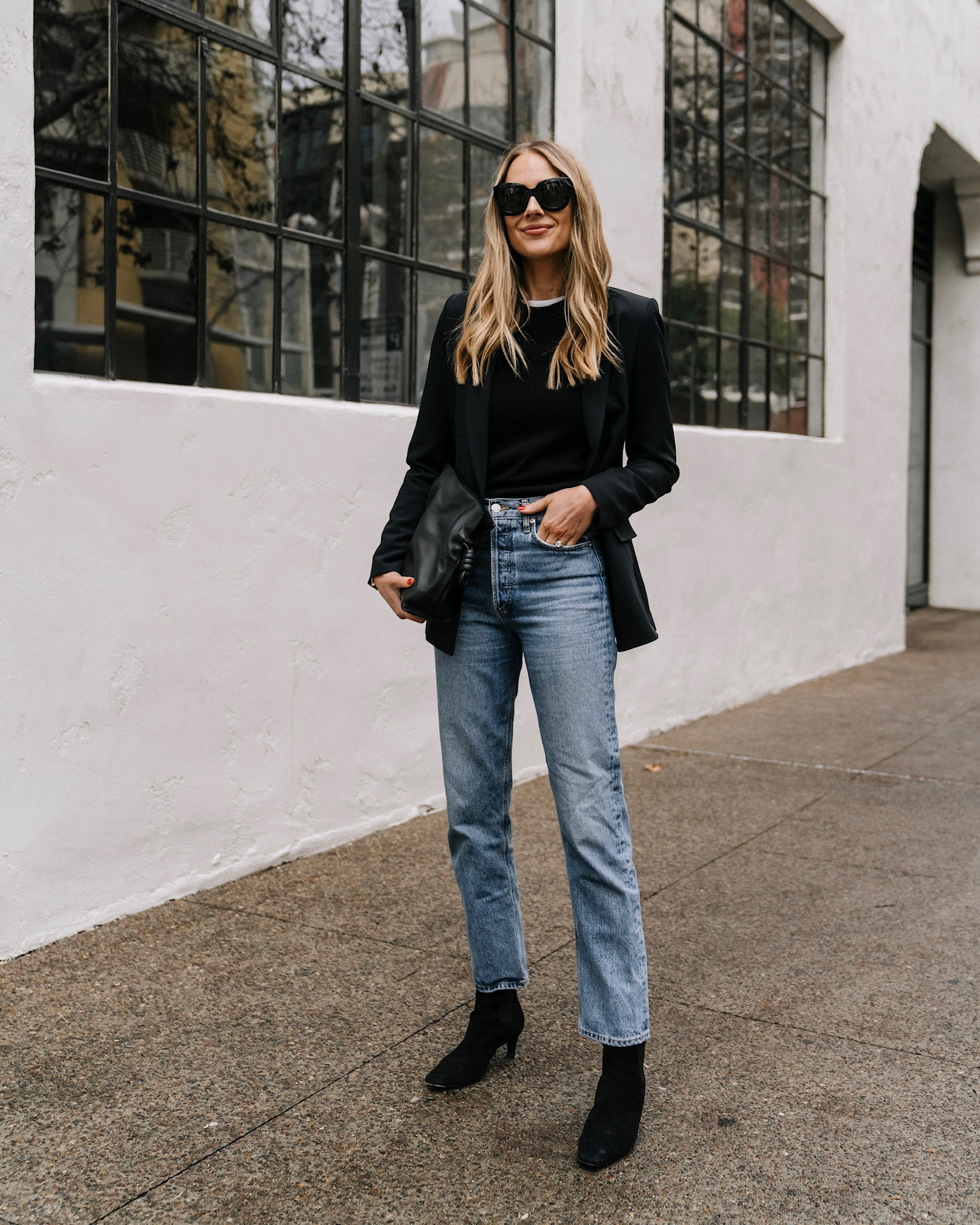 Fashion Jackson wearing black blazer (small), black sweater (xs), white tshirt (xs), AGOLDE jeans (tts), Totême black booties (tts) Loewe black handbag, business casual #fashionjackson #blazer #businesscasual

#LTKworkwear #LTKshoecrush #LTKstyletip