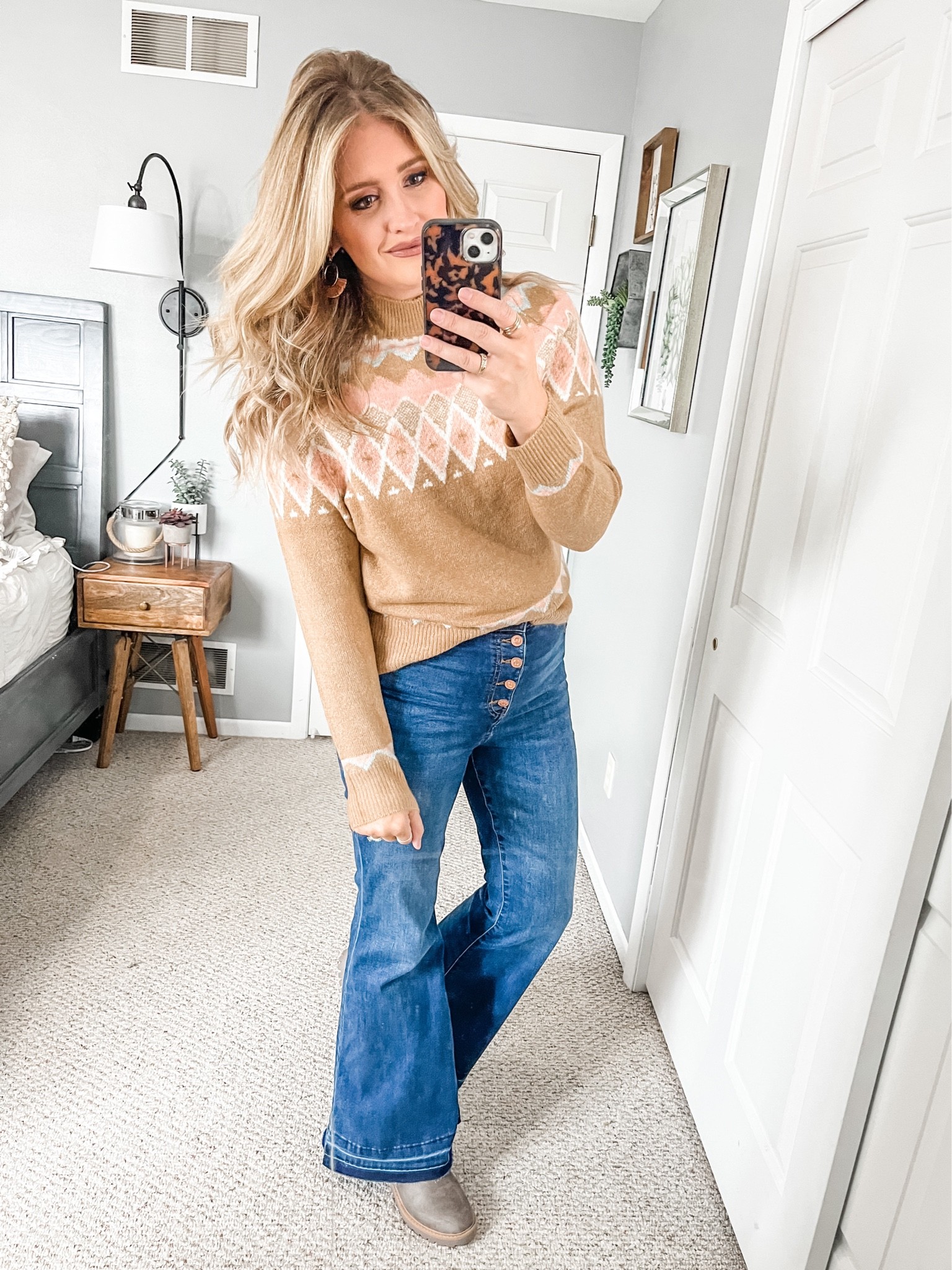 This sweater was made for a cozy night at a winter lodge! It’s so soft and the colors are beautiful, too. 
I’m in medium but would prefer to size up for a loose fit.
Jeans TTS wearing 11.
#walmart 

#LTKstyletip #LTKunder50