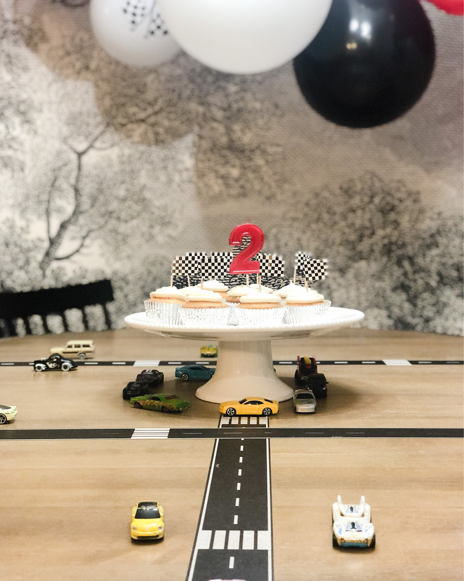 Car themed birthday decor, checkered flag cupcake toppers, black road decorative tape, boy birthday decor, Amazon finds.

#LTKkids #LTKfamily