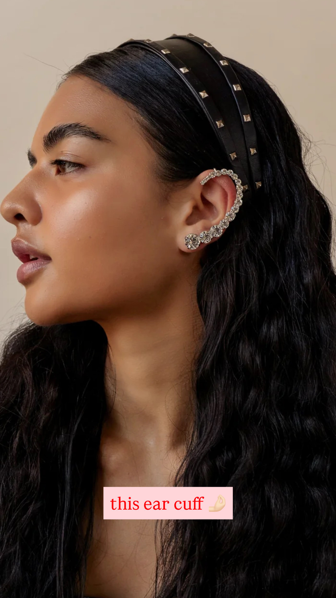 The ear cuff I keep recommending to women who want jewelry impact without the commitment of more piercings. Lelet NY's Leia Ear Cuff sits on your left ear and does all the heavy lifting — rhodium-plated base, Swarovski crystals tapering in size so it reads as intentional, not costume-y. It adjusts with an earring post and a wide ring at the top, which is genuinely more secure than most ear cuffs I've tried.
Fair warning: it's a statement. This isn't a background piece — it pulls focus, so I'd keep the rest of your jewelry minimal. One ear, one moment.
Wear it with a pulled-back bun (obviously), a sleek low pony, or even tucked under a half-up style when you want it to peek out mid-dinner. Great for events where you want to feel dressed up but don't want to fuss with a full jewelry stack. 

 
