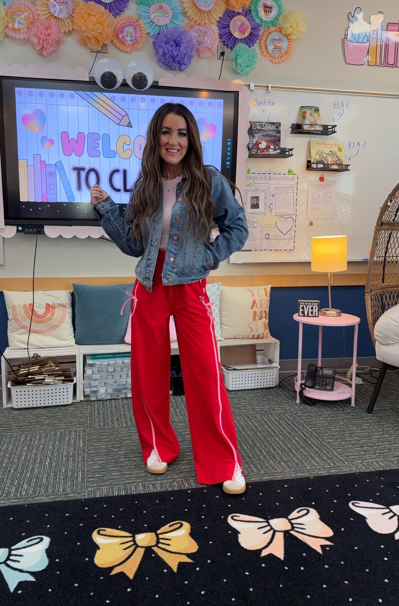 Give me all the Valentine’s Day looks! Did you notice the pink stripe and bows on the pants? Perfection. ❤️🎀

Red wide leg track pants with side stripe and tie detail, soft neutral tee, classic denim jacket for layering, and easy everyday sneakers. Teacher outfit idea, casual school outfit, comfy teacher pants, wide leg pants outfit, classroom style, spring teacher outfit, casual workwear, everyday teacher look, red pants outfit, denim jacket outfit, target style, casual valentines outfit, mom outfit 

#LTKOver40 #LTKFindsUnder50 #LTKmomlife