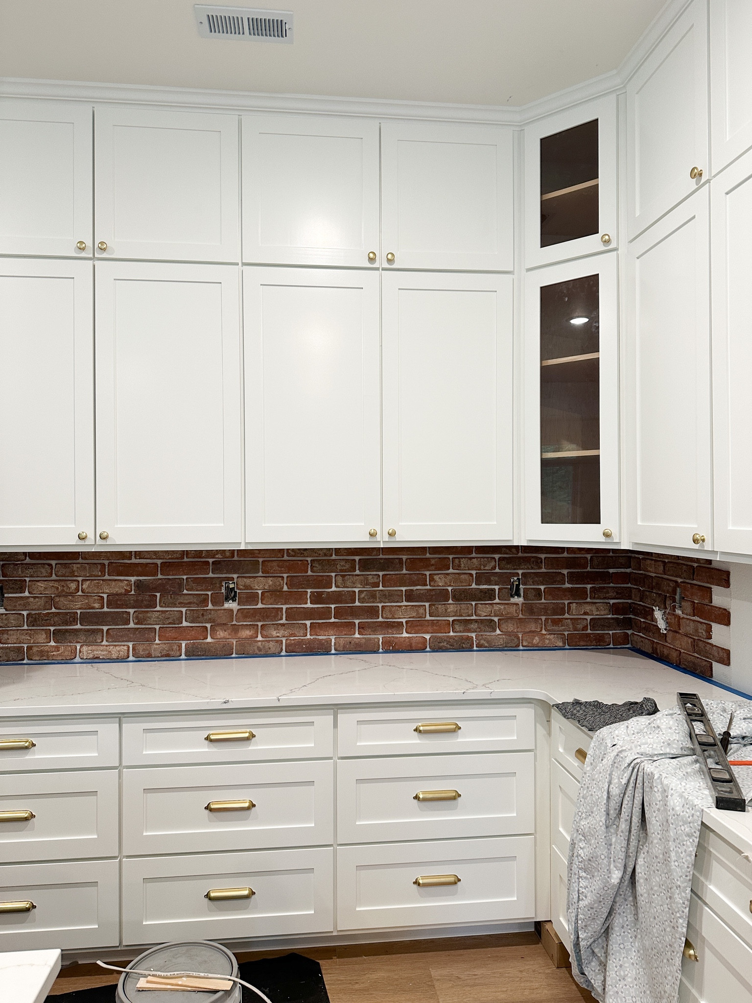 All the supplies were using for our DIY limewashed brick backsplash 