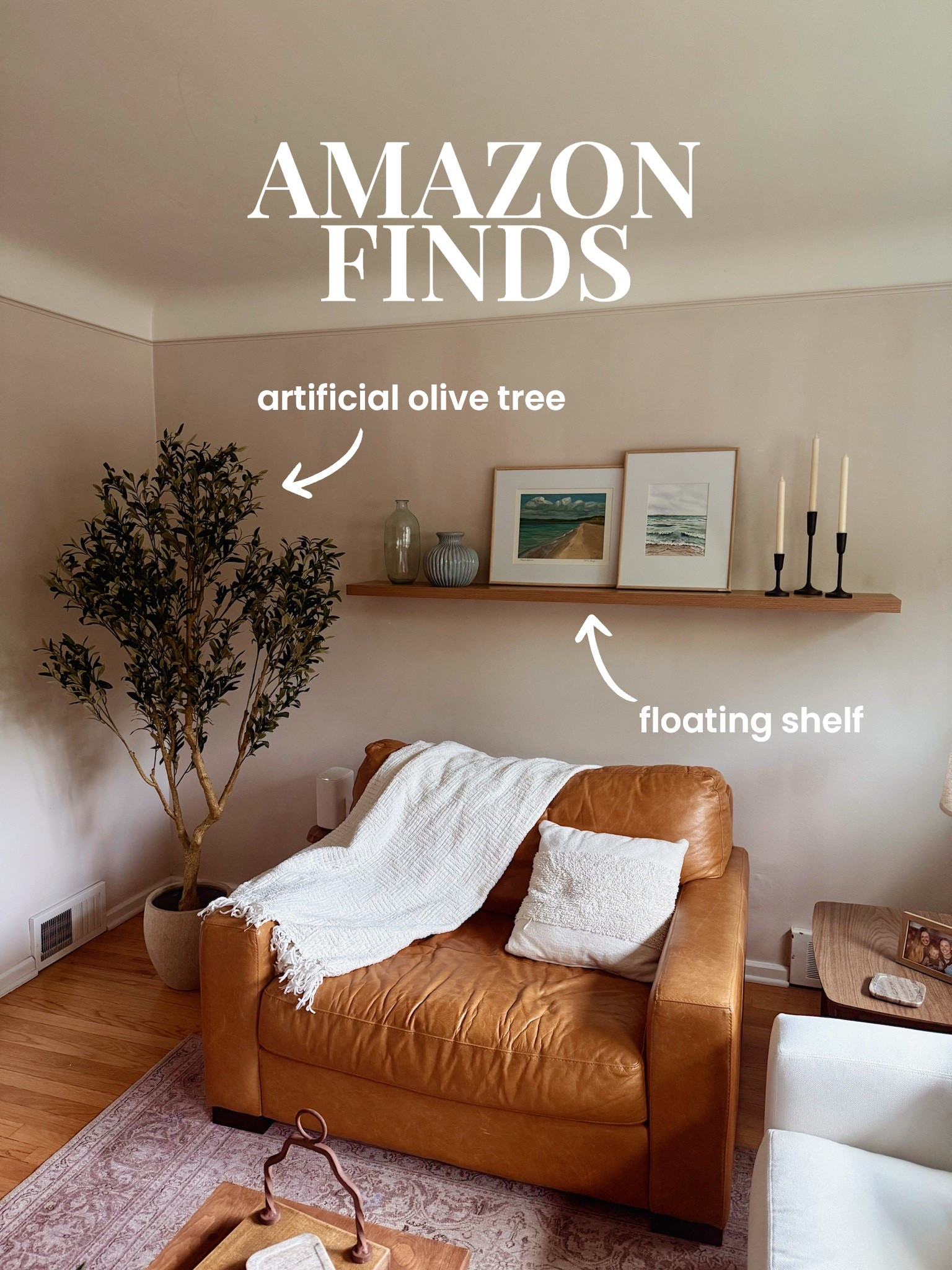 Newest Amazon additions to our living room - the floating shelf in color “natural” and the 6’ olive tree that brings the room together! Absolutely in love with how this turned out!

#LTKHome #LTKSaleAlert