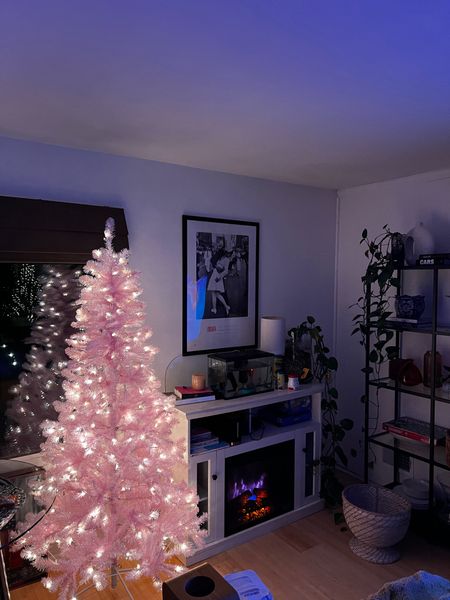 If you’ve been following me on here then you know that I’ve really leaned into #barbiecore this  year. So it’s no surprise that I would have a pink tree! I meaaannn, she’s such a vibe, especially at night. 

#LTKHoliday #LTKSeasonal #LTKhome