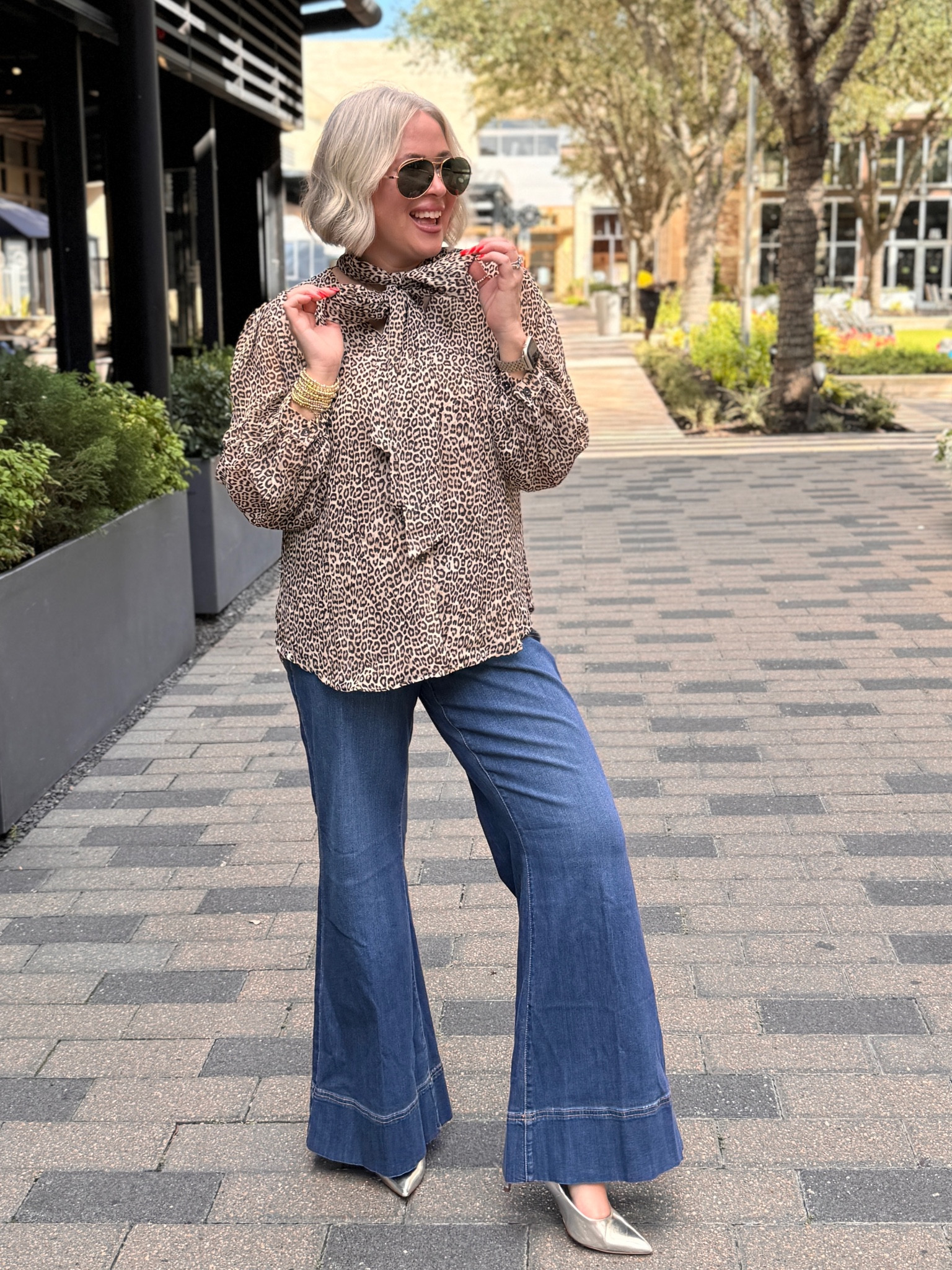 The tie neck on this leopard top is perfection! It just elevates the outfit. I paired with these amazing trouser jeans!

Jeans size 1.5 (could wear 1) very stretchy 
Top size - 2

#LTKSeasonal #LTKMidsize #LTKOver40