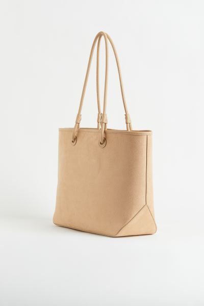 Shopper with two faux leather handles at top. Unlined. | H&M (US + CA)