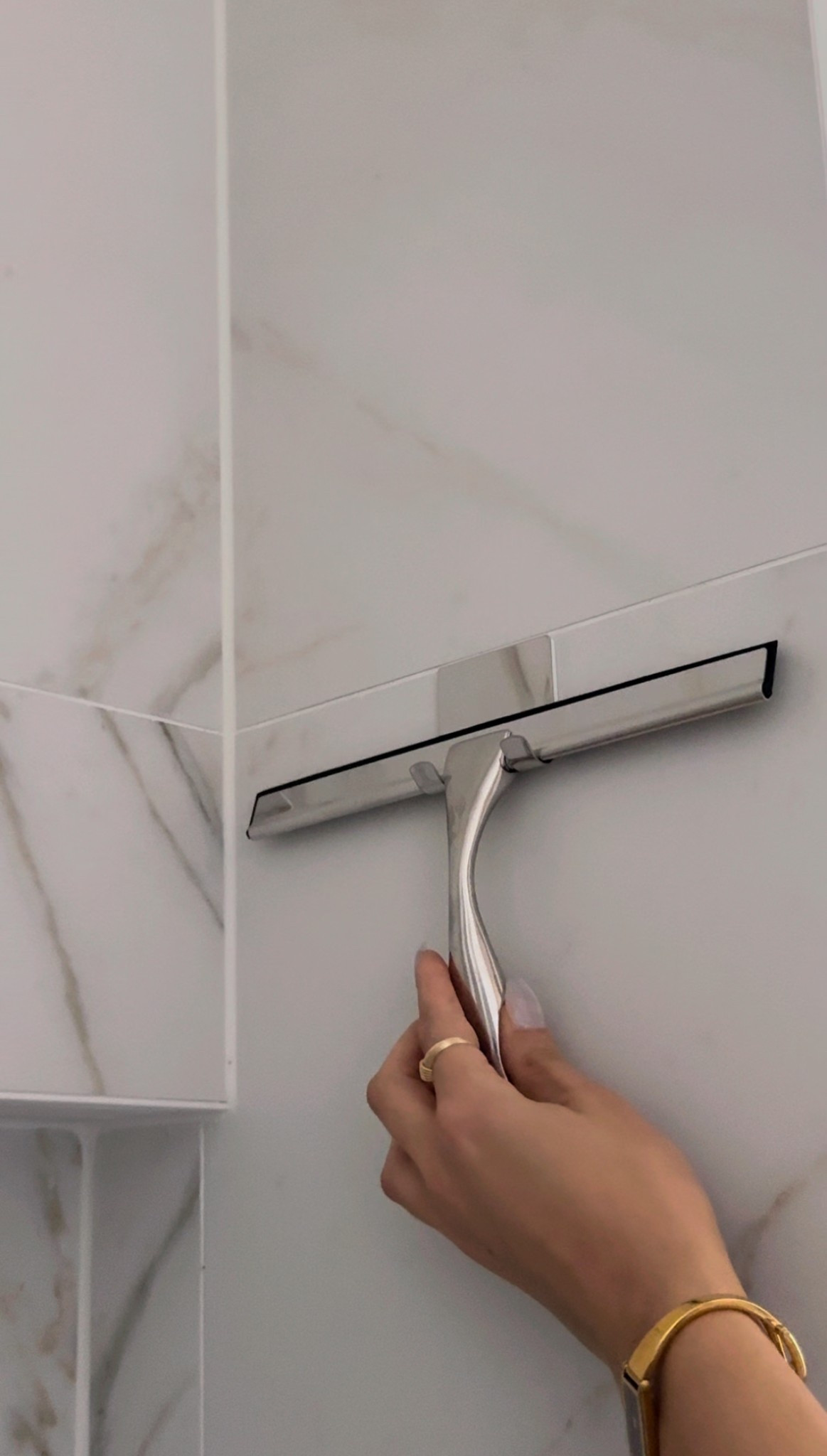 The adhesive hook I added to my shower to hold my squeegee!

#LTKFindsUnder50 #LTKHome