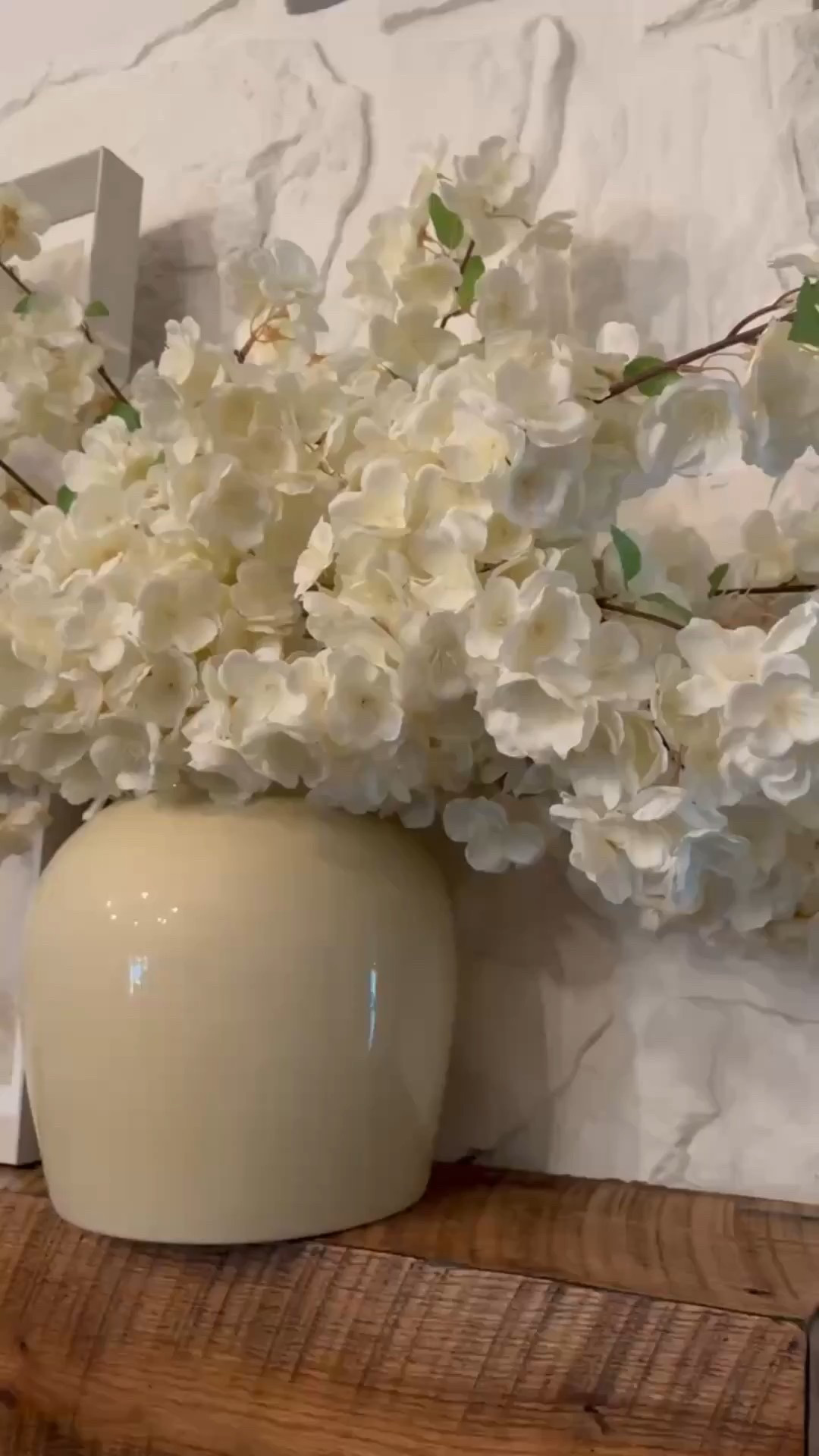 Fresh + timeless styling 🌿 An ivory ceramic vase filled with white faux hydrangeas makes the perfect statement, layered in front of soft framed artwork. Set on a rustic wood surface with a stone wall backdrop, this vignette blends natural elegance with cozy charm. ✨

#HomeDecorInspo #CeramicVase #FauxHydrangeas #FramedArt #RusticWoodDecor #StoneWallStyle #MantelDecor #TimelessStyling #eanesinteriors


#LTKHome #LTKvlog #LTKFindsUnder100
