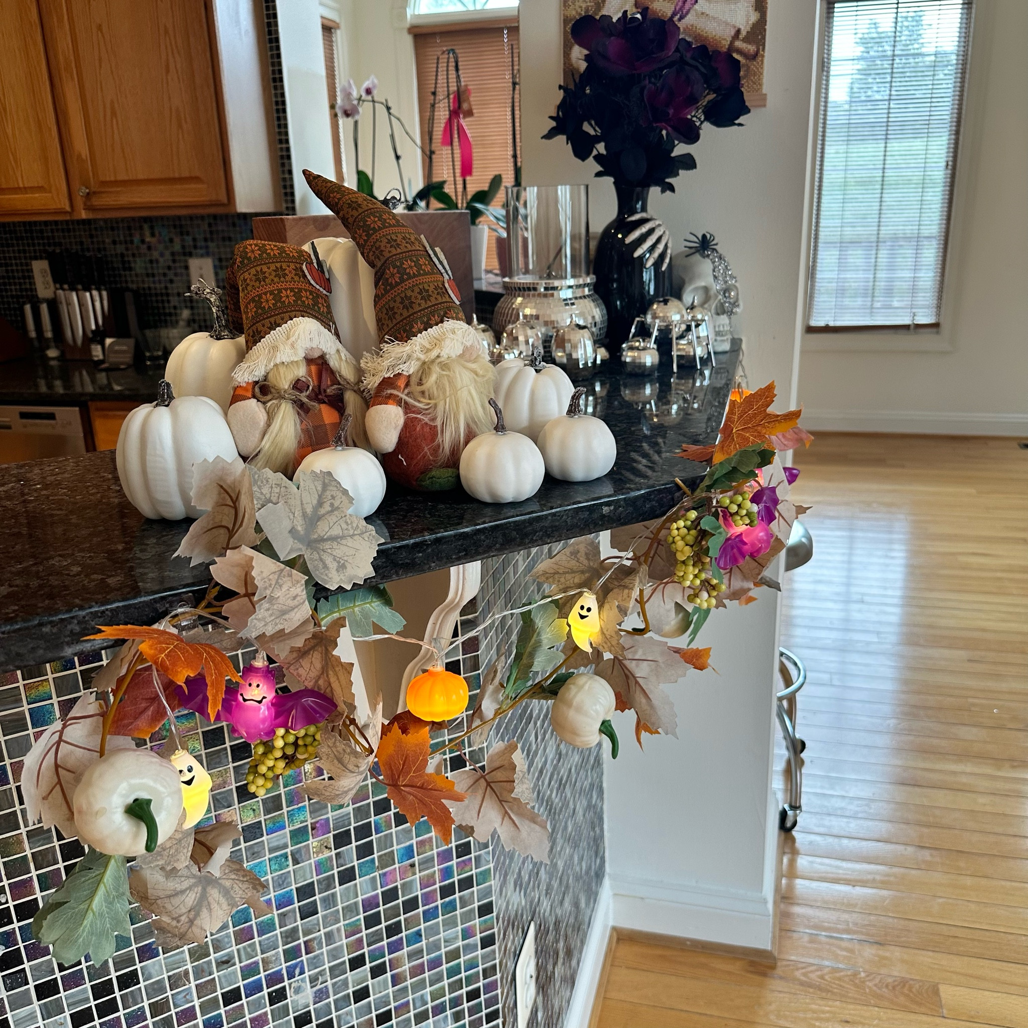 🍂✨ Embracing the cozy vibes of autumn with this charming fall decor! Love how the whimsical gnomes and mini pumpkins bring a touch of magic to the kitchen. The vibrant garland adds a pop of color, perfectly capturing the spirit of the season. 🍁🍄 #FallFeels #AutumnDecor #CozyVibes

#LTKHome #LTKFamily #LTKFallSale