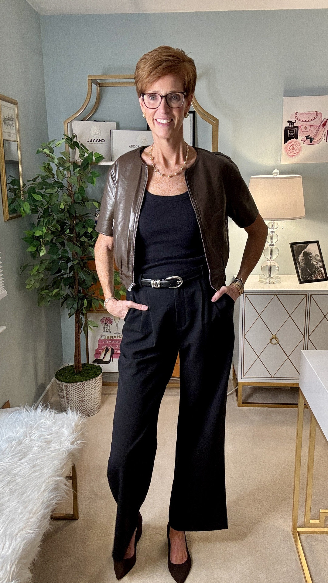 Black and brown together? Absolutely.
At 56 and 6'1", I've learned that some of the best outfits come from ignoring outdated fashion rules.
And this is one of my favorite examples.

Want the links sent to you? Comment OUTFIT and I’ll DM them!

A simple black ribbed knit tee and tailored black trousers create the foundation. Add a cropped chocolate brown leather jacket and brown suede pointed-toe shoes, and suddenly those classic black pieces feel completely different.

What I especially love about this combination is how the rich brown softens the black without sacrificing that polished, sophisticated look.

It's an easy fall outfit that feels modern, elevated, and wearable. Exactly the kind of timeless style I love sharing for women over 40 and 50.

And if you're tall like me, the high-waisted trousers and shorter jacket are a great combination for creating beautiful proportions.

Now I want to hear from you!
Have you embraced wearing black and brown together, or is this one fashion rule you're still hesitant to break?
Tell me in the comments!

SAVE this outfit for your next fall style inspiration, SHARE it with a friend who loves classic fashion, and FOLLOW @atalldrinkofstyle for more timeless outfit ideas, tall-friendly fashion, and wearable style for women 40+.

You can shop the outfit through my links.