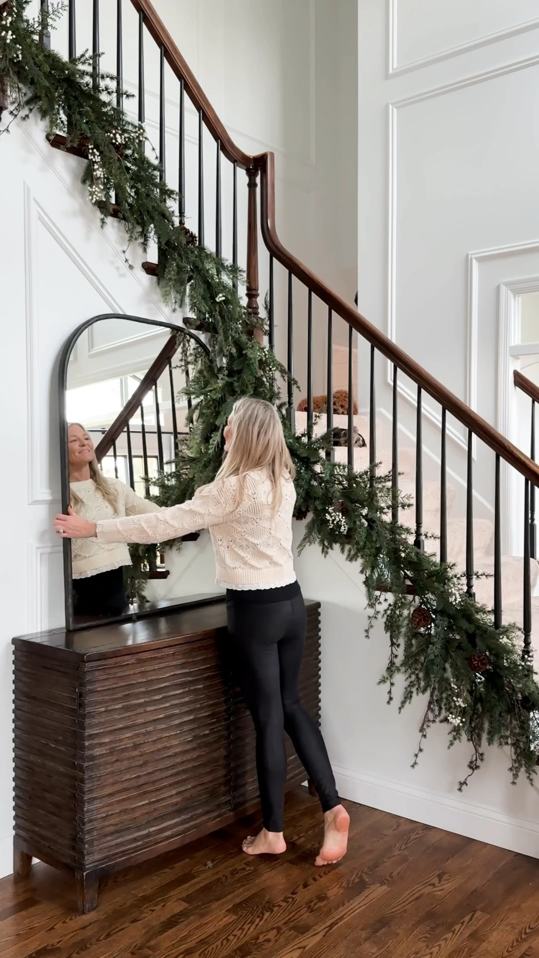 Trending staircase garland ! This garland is so full and beautiful I decided to try it on the base of our staircase this year instead of the top and I couldn’t love it more! 

#LTKHome #LTKWatchNow #LTKHoliday