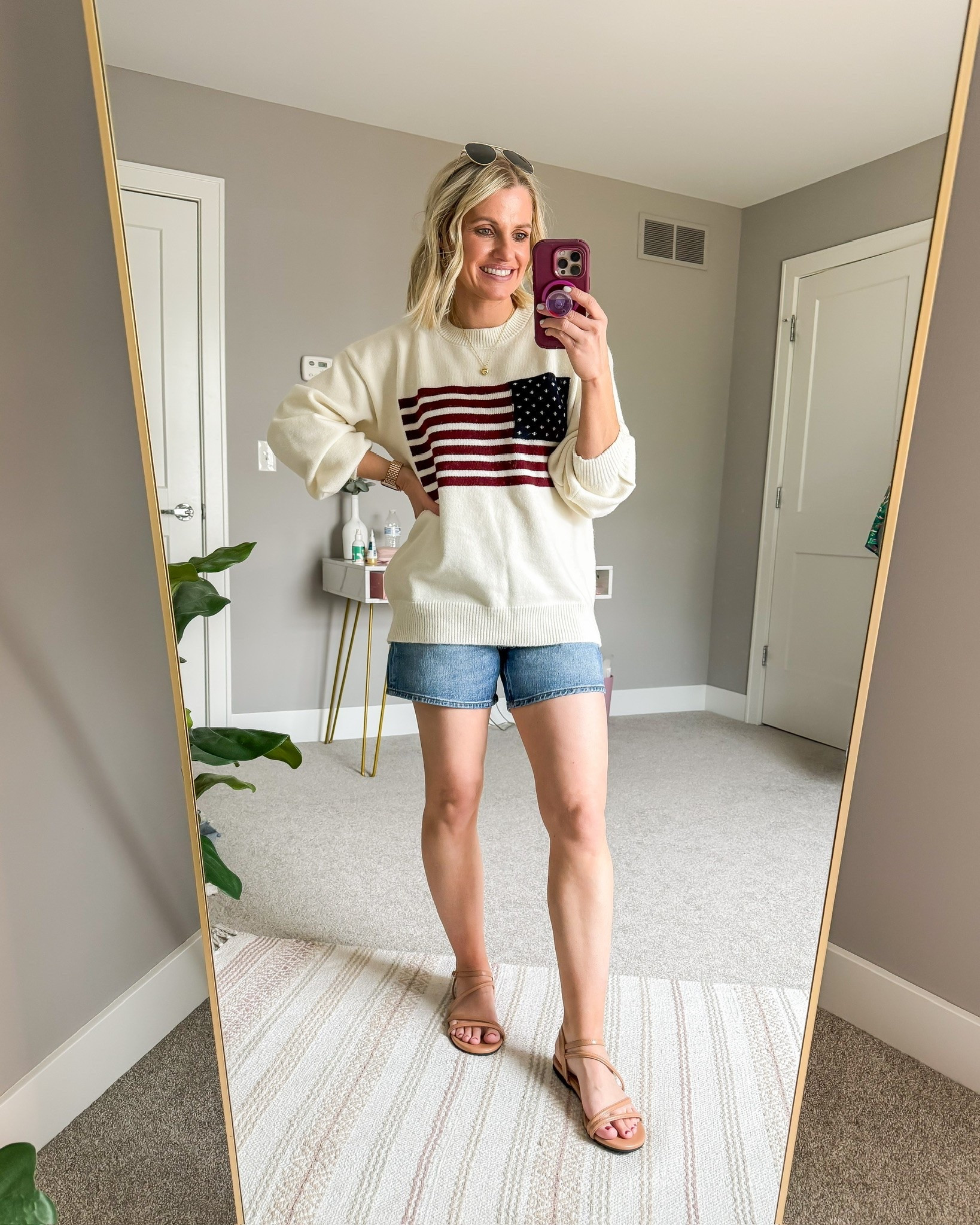 Patriotic outfit idea for Memorial Day. Cute American flag sweater outfit.

#LTKootd #LTKOver40 #LTKSeasonal