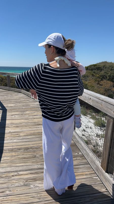 My white linen pants are old from Pink Lily and the sweater is actually my mom sweater and she believes that she got it from Nordstrom rack a couple years ago. So I just had a deep dive and found a bunch of similar items that I will link here! My white baseball cap is from PonyFlo & mg code is AYLA10 or AYLA15… 
#vacation #linenpants 

#LTKswim #LTKtravel #LTKSeasonal