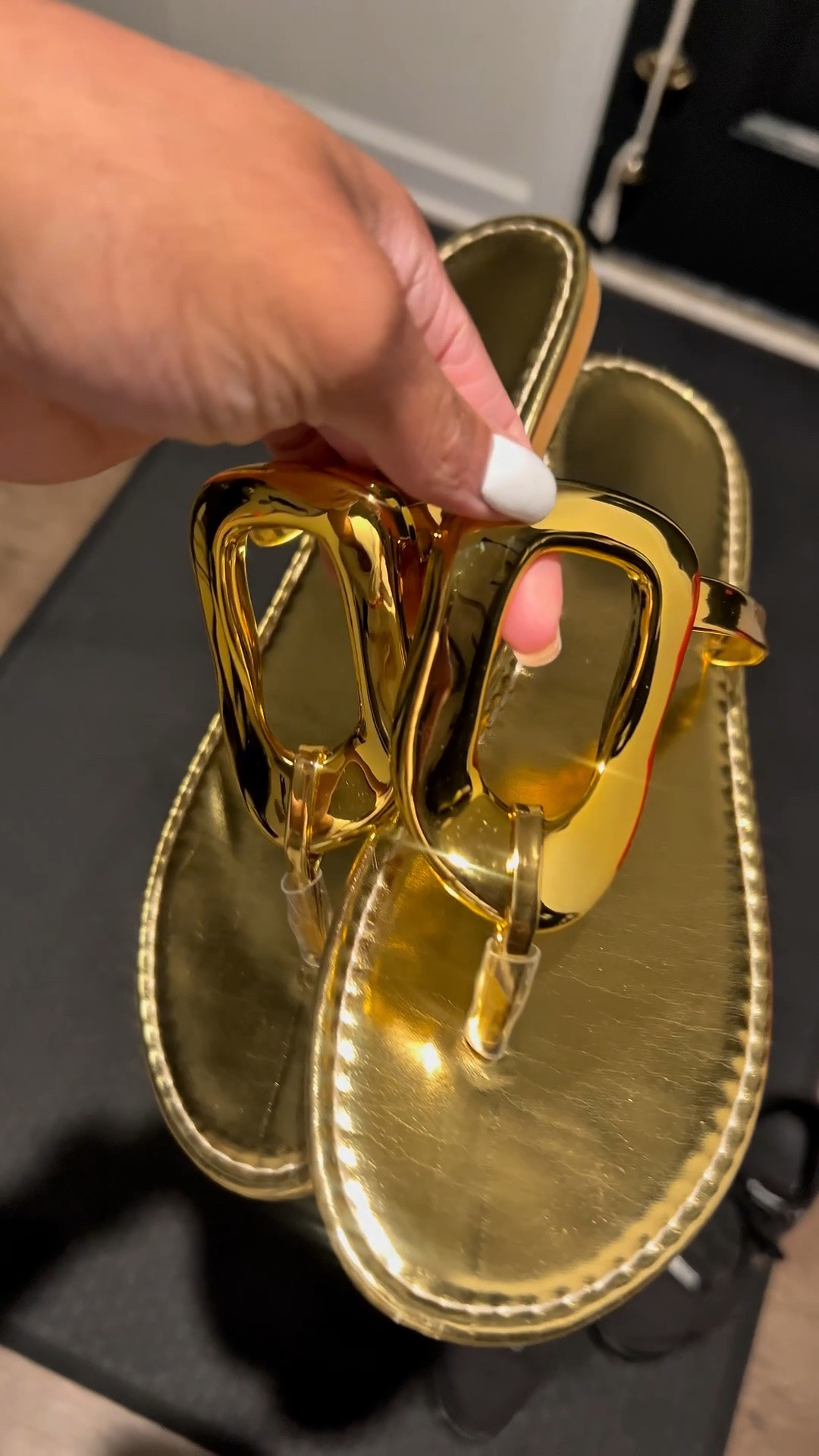 Gold glamorous flat sandals that are also comfortable to wear.