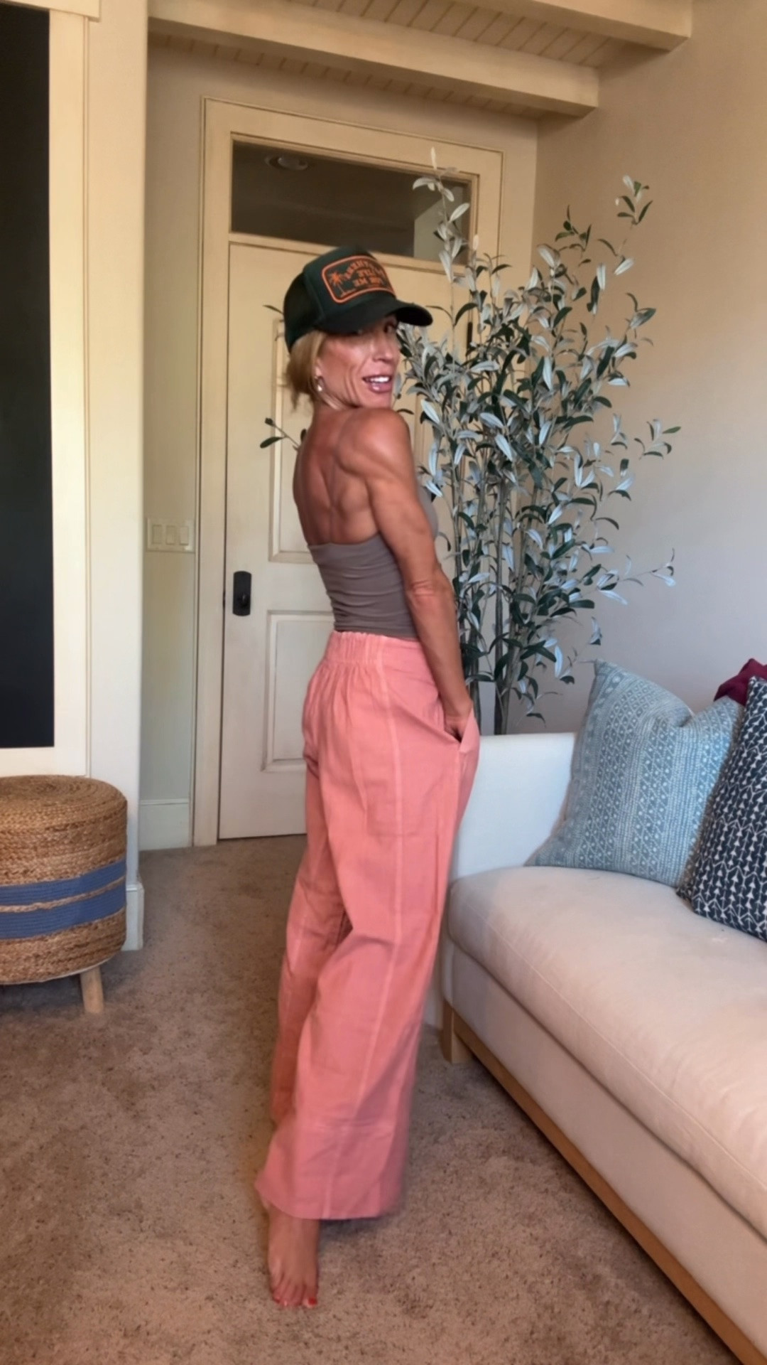 Thee Free People pant we all need. 
Wearing xs here. 
Tank xs. 
Hat is Mommday

#LTKmomlife #LTKgrwm #LTKOver40