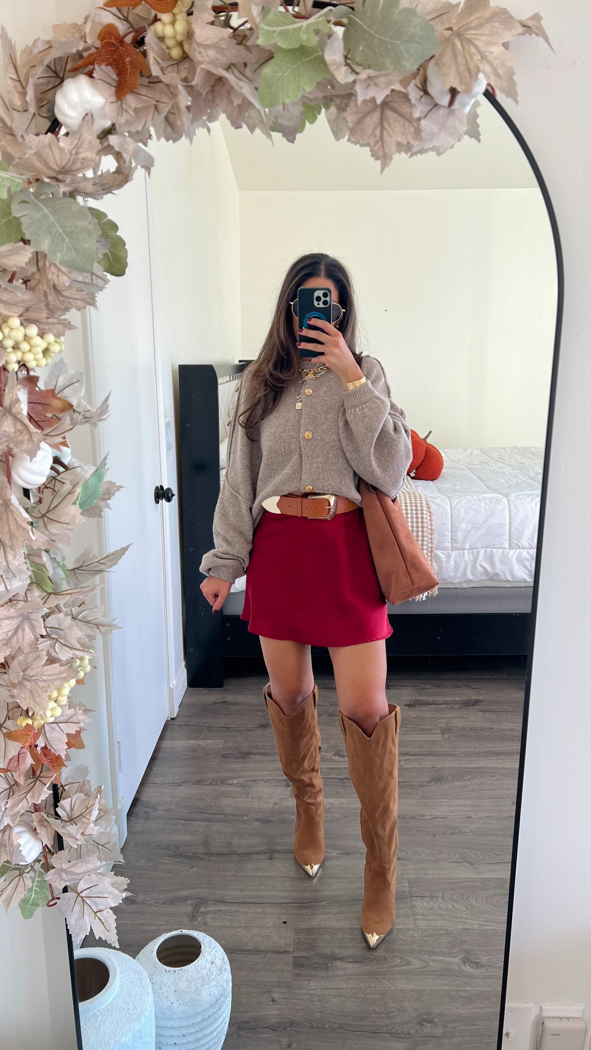 Casual sheet Thanksgiving outfit idea very simple with a satin short skirt and a cardigan

#LTKStyleTip #LTKSeasonal #LTKFindsUnder50