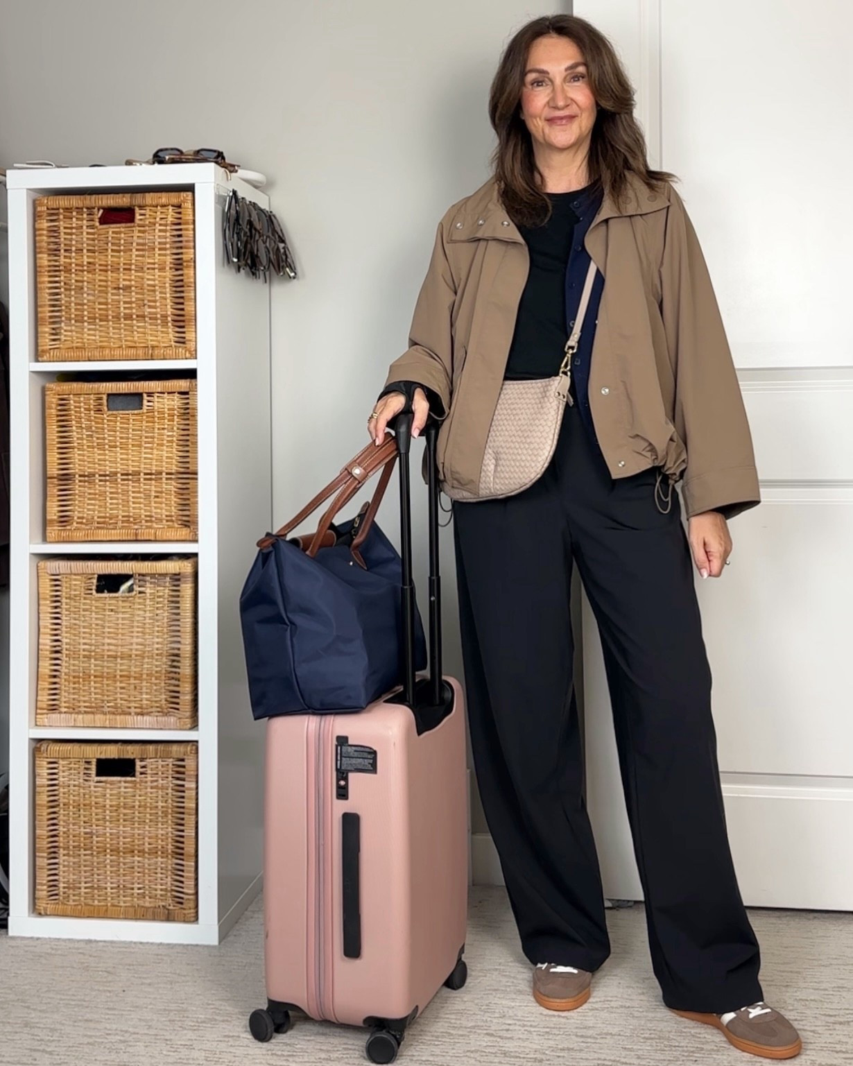 Travel outfit! I love these pants for travel, they are stretchy and so comfortable but look elevated. I’m 5’ 7” size 4ish wearing my usual size 4 in the 31.5” inseam. 
Wearing S in the merino wool tee, I reviewed four brands of merino tees recently and this one was my favorite. Merino wool tees are great for travel cause they are soft, absorb odors and if you need to wash them they dry quickly.
Also linked my crossbody bag, it also has a shorter wider strap. 
