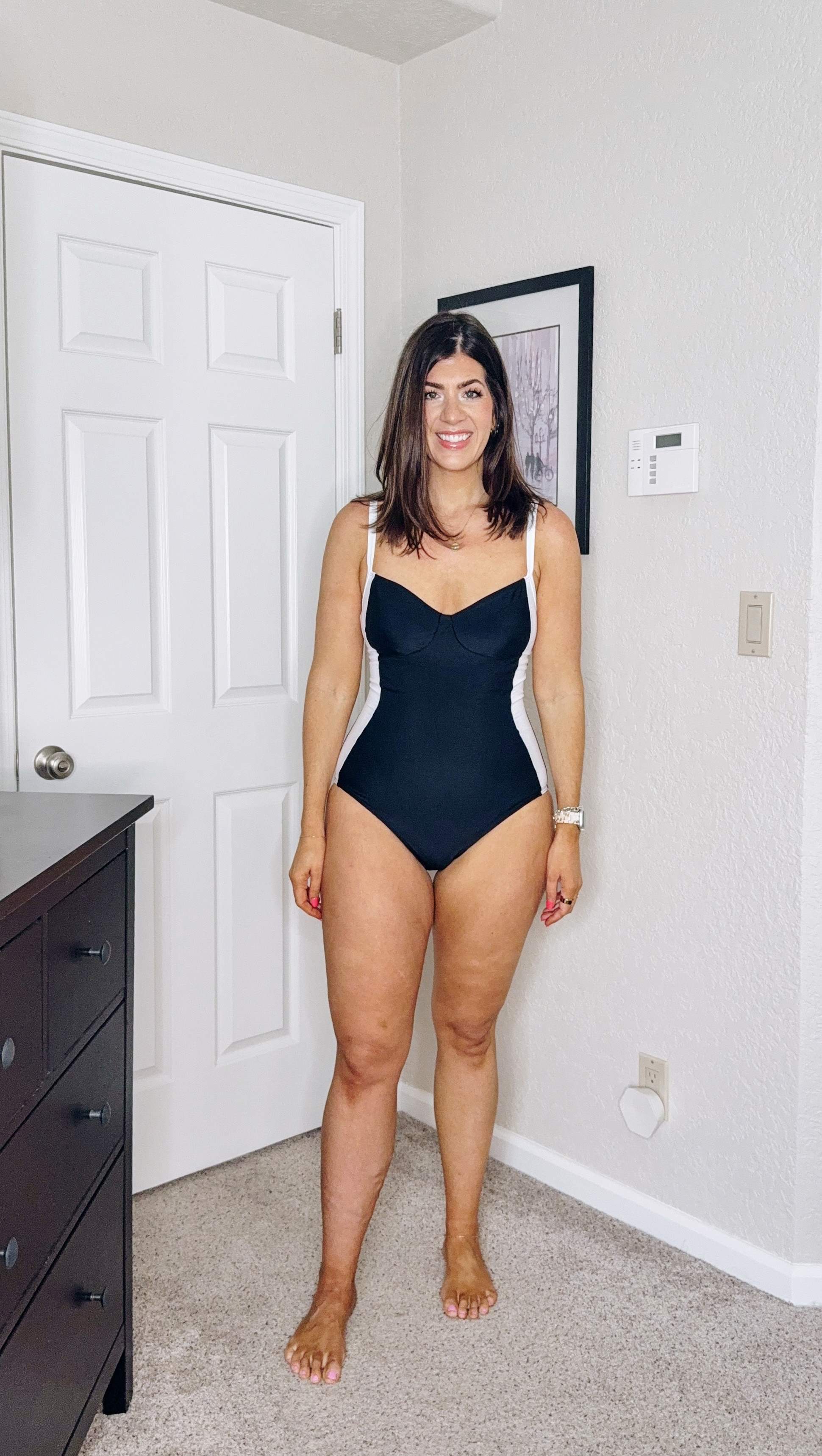 In a large in the tummy control one piece swimsuit 

#LTKSwim #LTKMidsize #LTKFindsUnder50