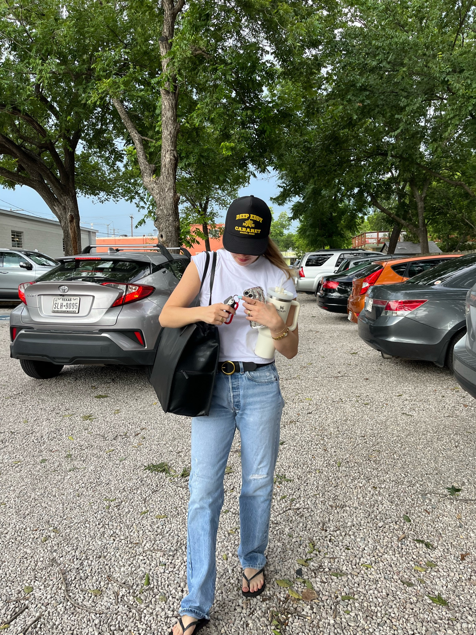 Top to Bottom 
Hat: trucker hat from Deep Eddy Cabaret in austin 
Shirt: Cottonon
Bag: beis work tote
Jeans: vintage 80’s Levi’s 501
Flippies: havaianas 

#LTKfit #LTKFind #LTKunder100