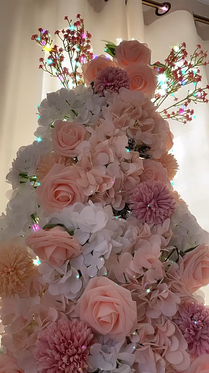 A fun way to reuse your Christmas tree. Grab a flocked tree, and grab faux flowers, I chose pretty pinks and whites, and stick them anyway you wish into the tree. You have a floral tree that you could even leave up until winter. 

#LTKHome #LTKSeasonal #LTKValentine