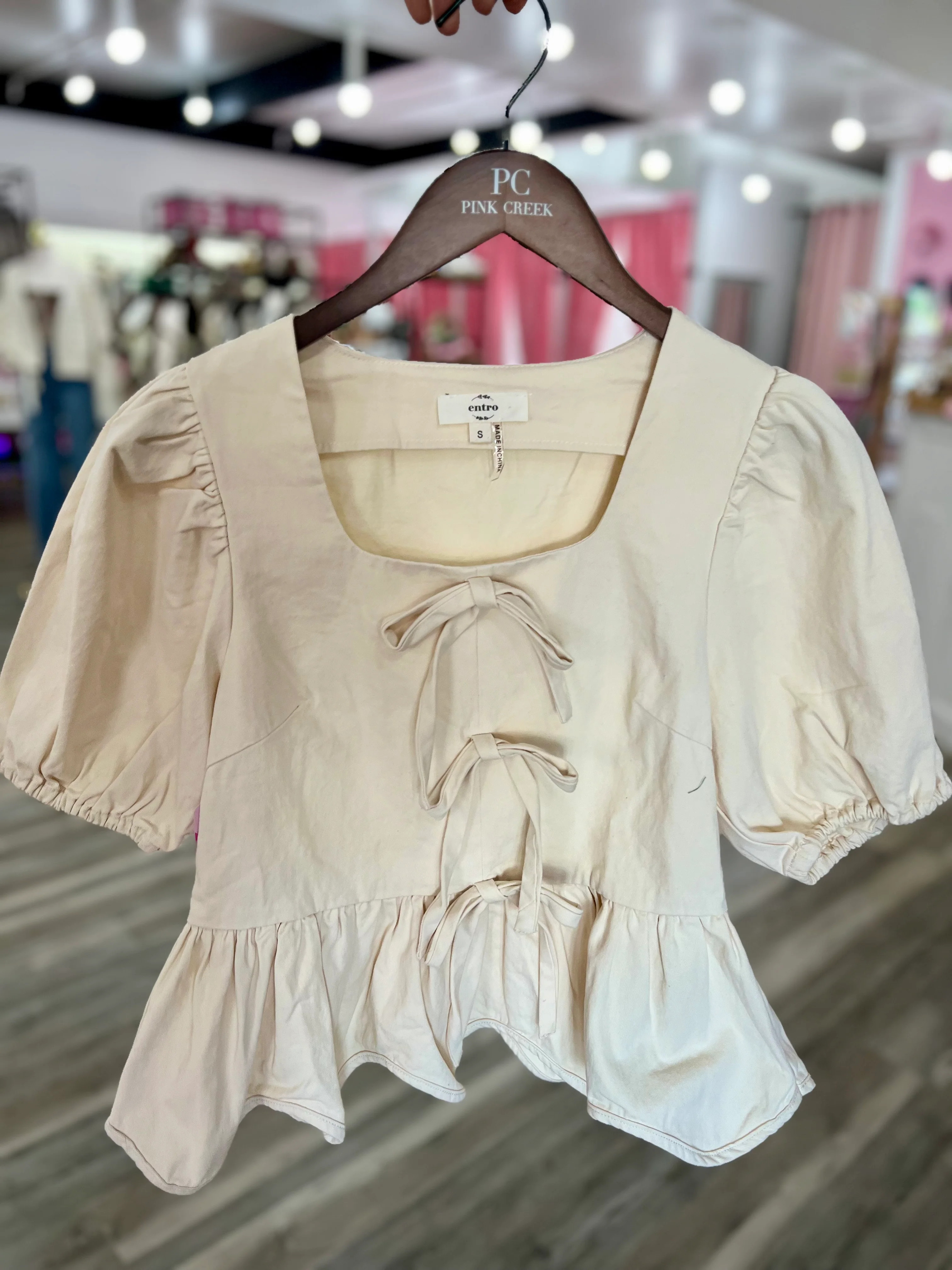 Jemma Bow Detail Ruffle Bottom Top - Ecru | Pink Creek