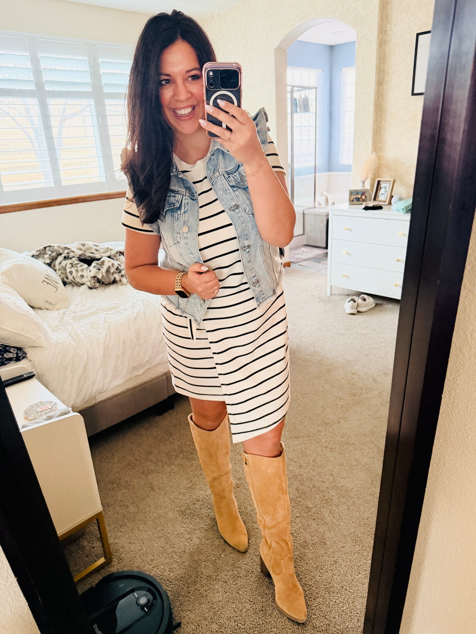 I literally wore these boots for 8+ hours and my feet didn’t hurt at all while wearing, or after taking them off. I went up a half size, to 8.5, which is what I typically do with boots. 

I am wearing a size large in this cute, cropped jean vest. I am obsessed about the ruffle sleeves! 

I found this t-shirt dress at Costco, but link led similair ones below. 

#LTKootd #LTKMidsize