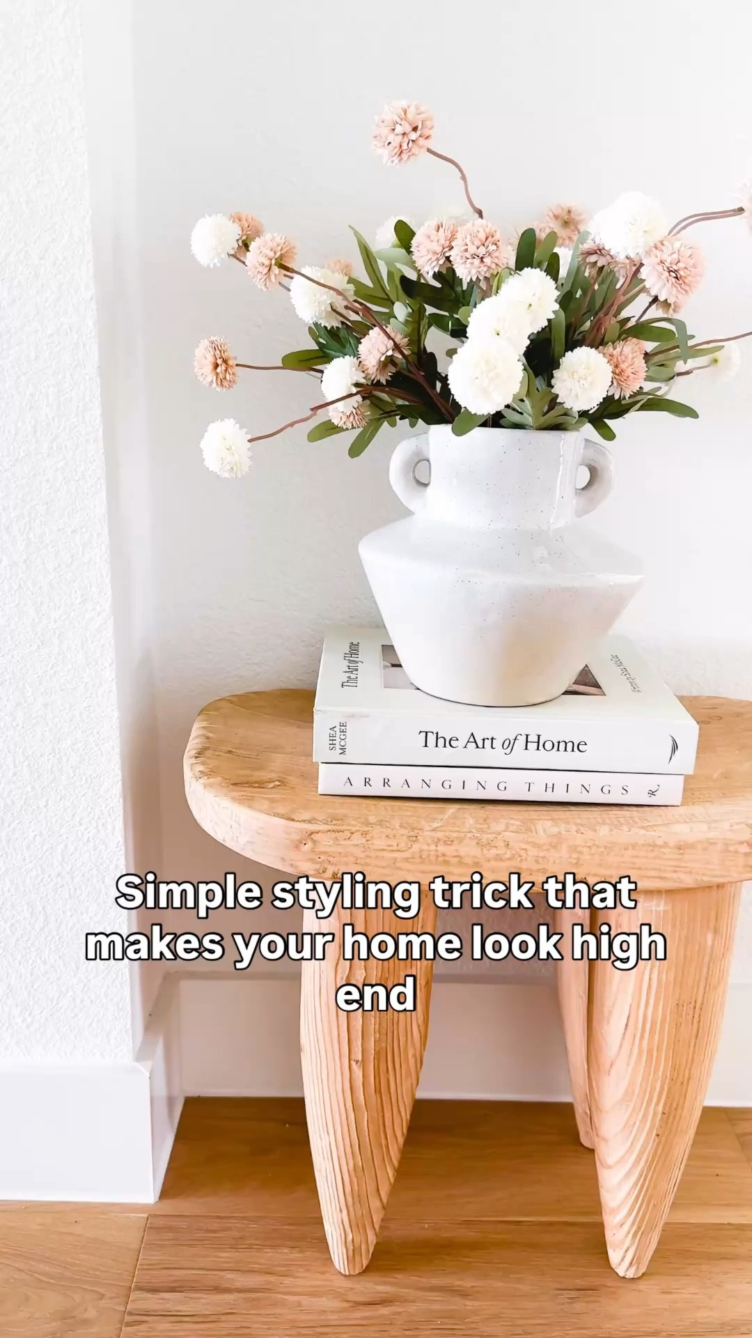 This simple styling trick is my go-to for making any space feel high-end without overthinking it—just a neutral ceramic vase, a stack of styling books, and soft florals instantly create a finished, elevated look. This works beautifully for small corners, entryway tables, living room decor, or even bedroom styling and is one of the easiest ways to decorate your home with a clean, organic modern feel. Follow me on LTK for daily home decor ideas, Amazon finds, and simple styling tips. neutral home decor styling, small corner decor ideas, entryway table styling, organic modern home, how to style a side table, decorating with books and vases, simple home styling tips, neutral aesthetic home decor

#LTKSaleAlert #LTKHome