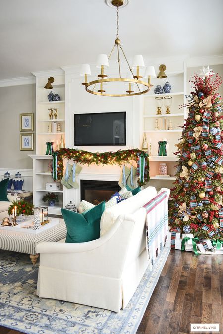 Our Christmas living room decor in red, blue and green with gorgeous gold accents. Elegant, simple, traditional and we love it! 

#LTKstyletip #LTKSeasonal #LTKHoliday