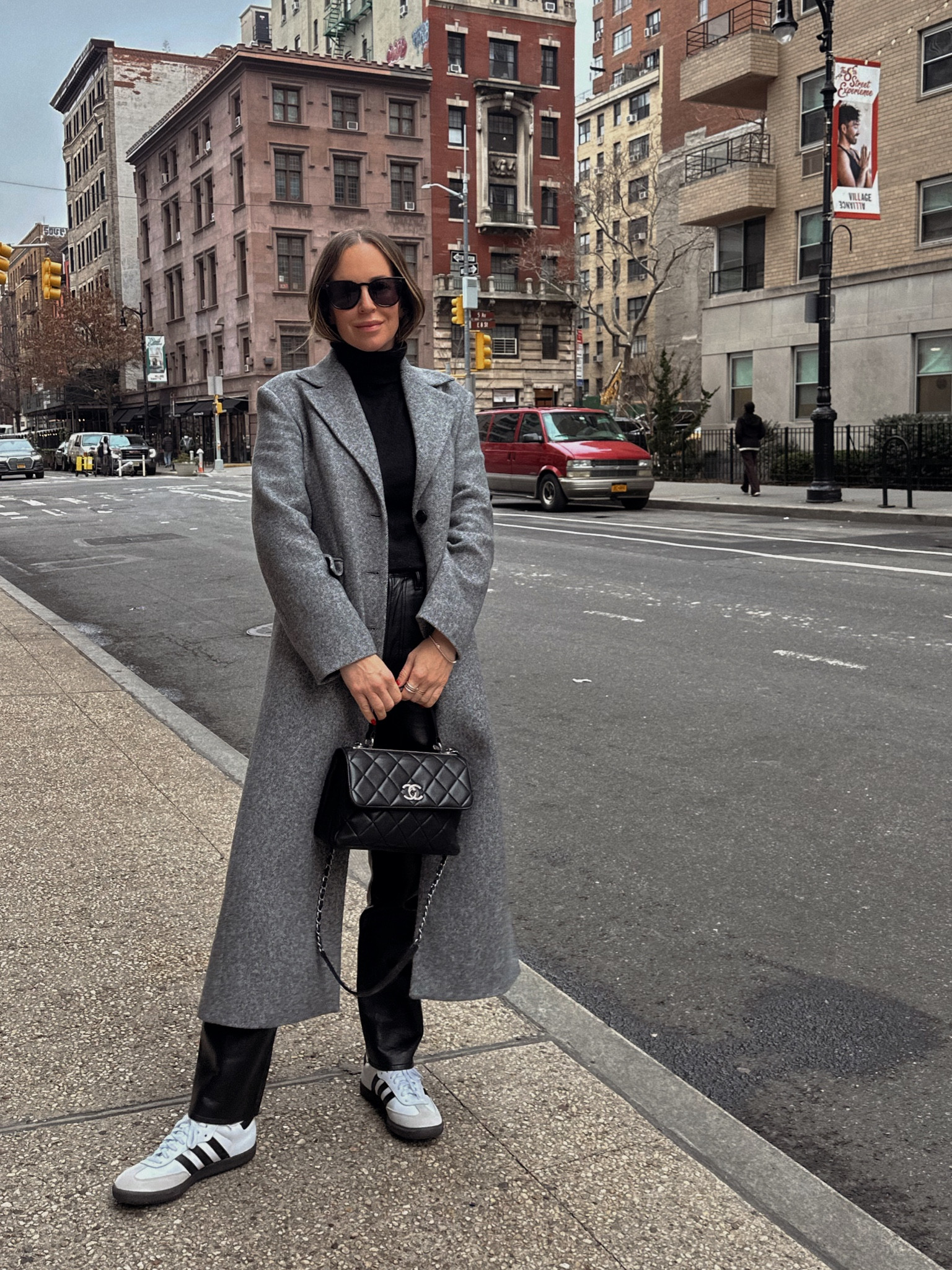 The adidas samba i took in my usual mens sneaker size. I wear a US 8.5 in womens and a 7 in these. Leather pants run TTS. In the coat I am wearing a small.  Id say it runs TTS.