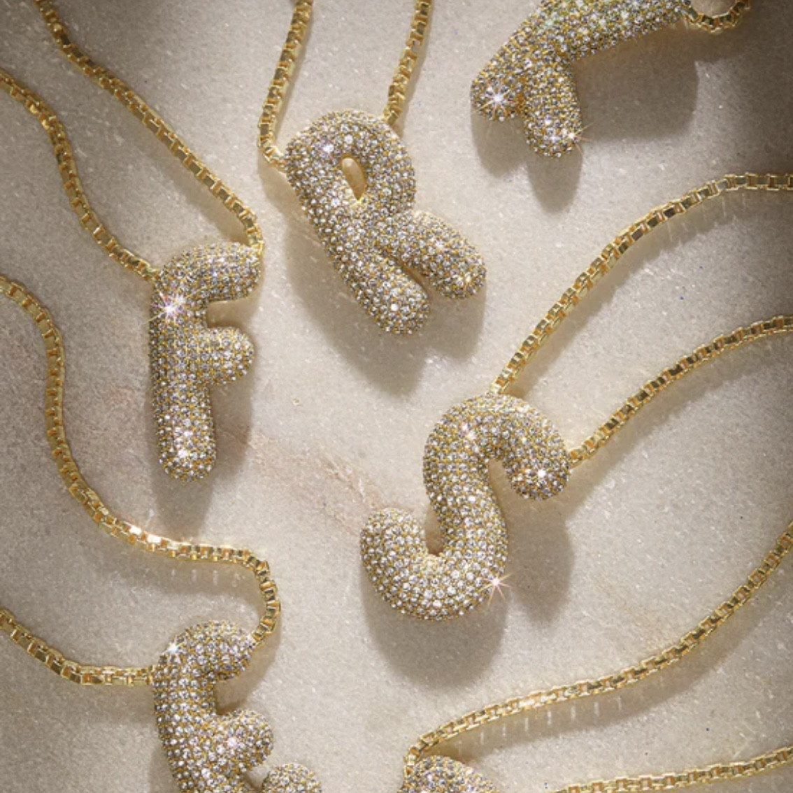 Hailey Bieber strikes again!! Channel Mrs. Bieber vibes with the BaubleBar Pavé Bubble Initial Necklace! ✨ This necklace, although a dupe for Hailey’s, is so chic and so glam. 💖 #BaubleBarBabe #HaileyBieberInspo

#LTKfindsunder100 #LTKGiftGuide #LTKstyletip