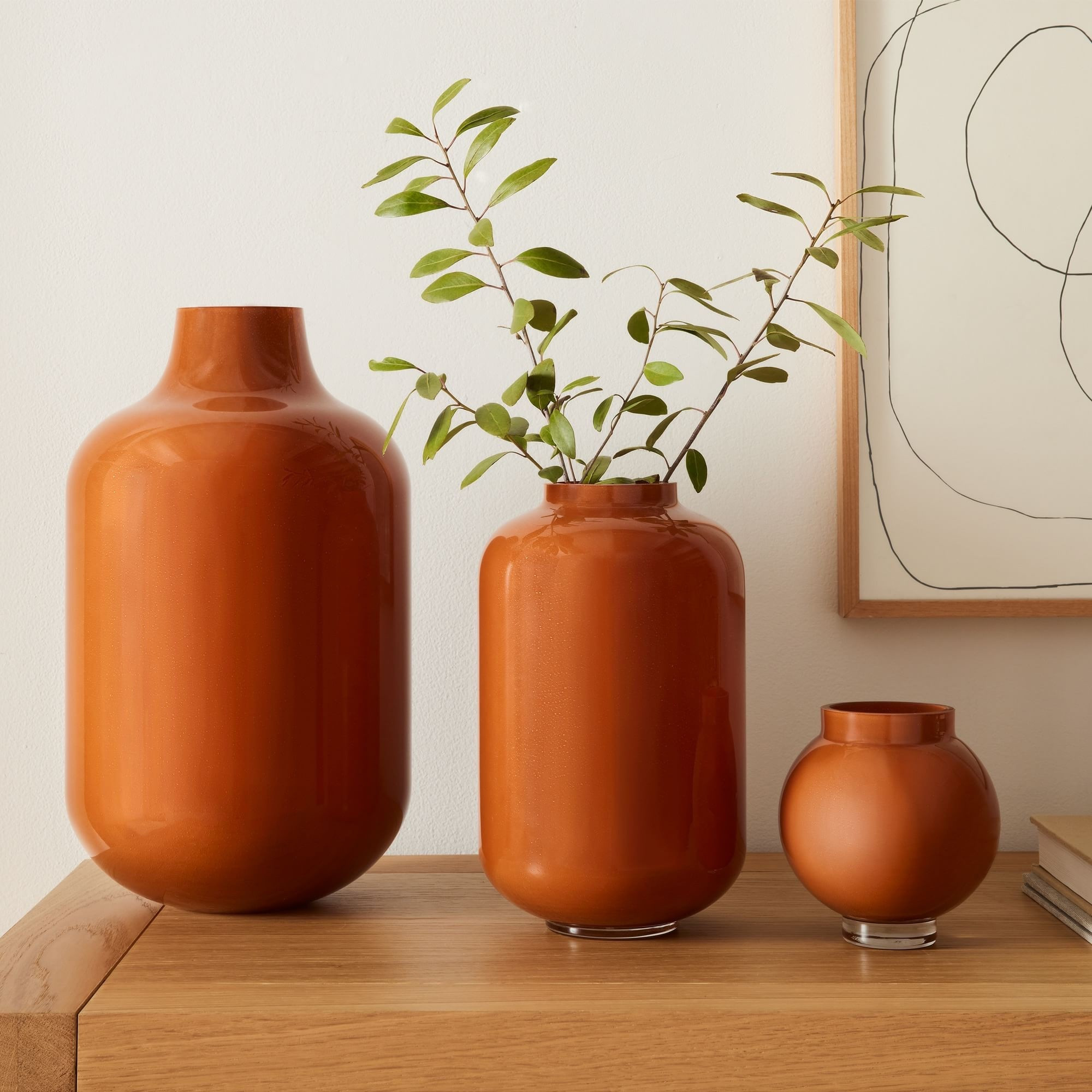 Swap to these Fall florals! West Elm has the cutest vases and faux greenery to match 

#LTKHome #LTKSeasonal #LTKHalloween