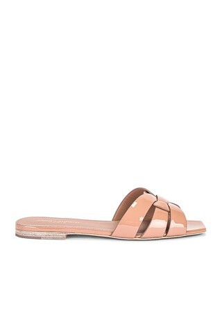 Saint Laurent Tribute Flat Sandal in Beige Rose - Blush. Size 39.5 (also in 35, 35.5, 36, 36.5, 37, 37.5, 38, 39, 40, 40.5, 41). | FWRD 