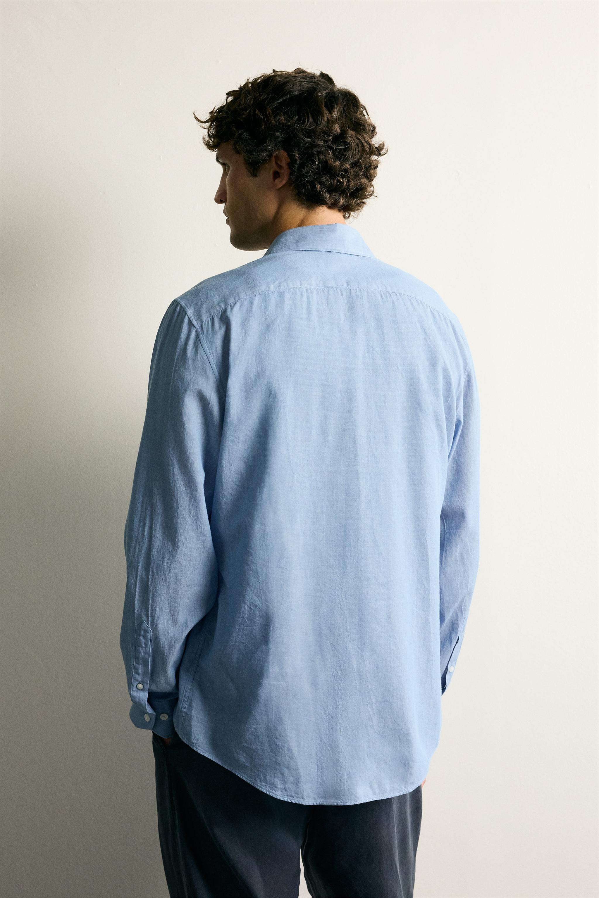 Model height: 188 cmRegular fit shirt crafted from cotton voile. Features an open regular collar,... | Zara UK