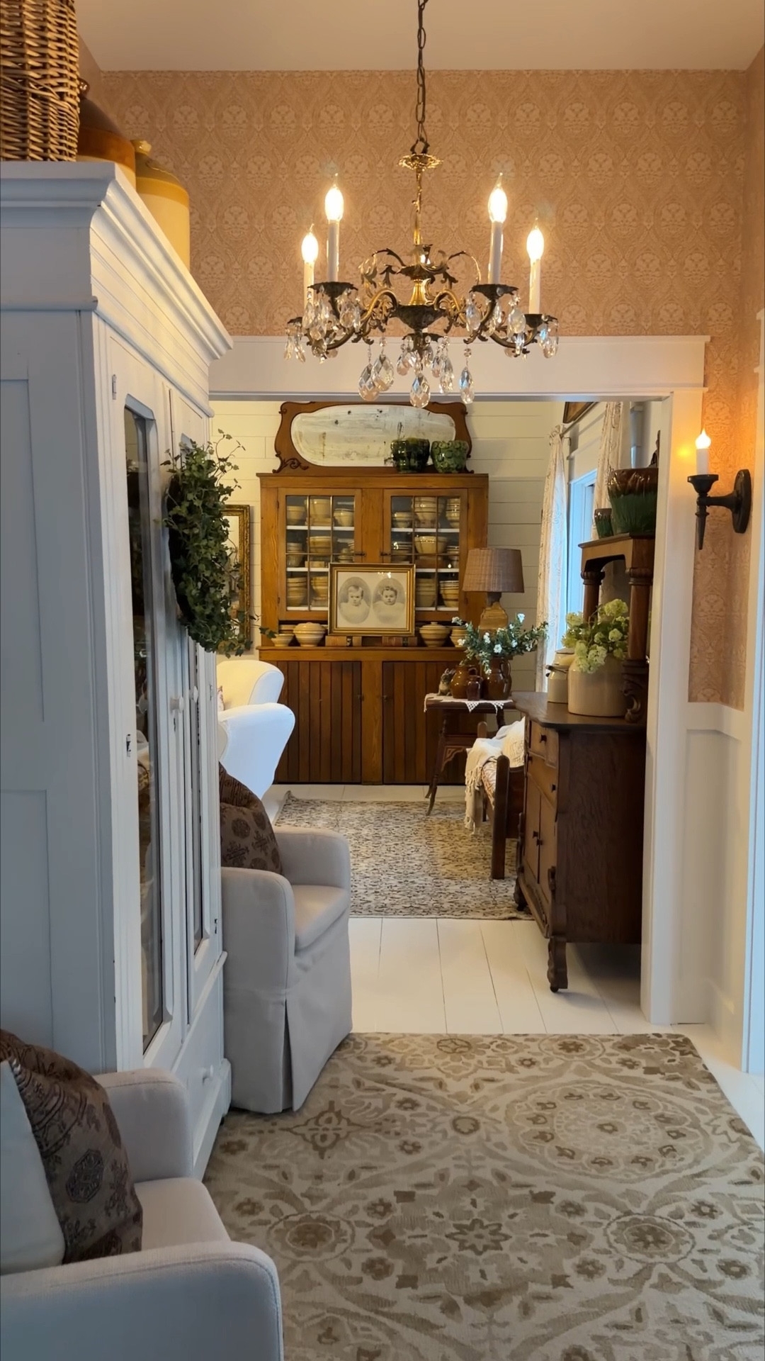 Our wallpaper is done! 

I can’t link it but here is the information. It is by Love Vs Design.  You design your own colors which they have a lot to choose from. You pick your pattern and then your colors. 
Pattern: Romantic Motif Wallpaper
Material: Glissade
Color: Ceramic, Peanut

My rug and wreath are old but found similar wreaths. I marked everything that is linked as exact products if they are. 