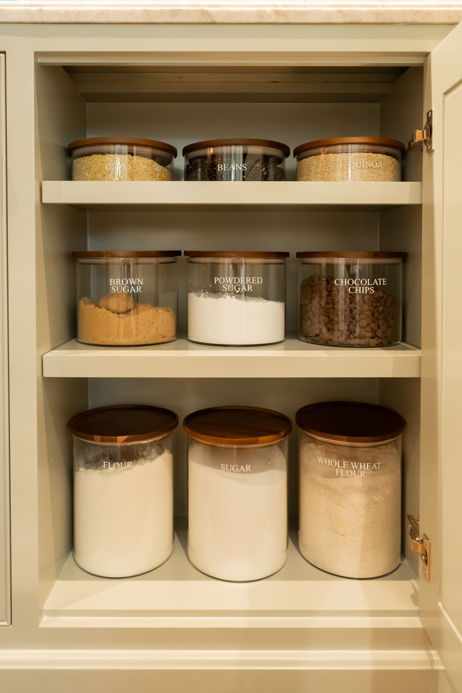 Could these Hold Everything Canisters from Williams Sonoma be any more perfect in this space?  The pantry in The Midland Legacy Home Tour is a beautiful example of where thoughtful organization meets everyday living. We've gathered the exact products used to create this refined, functional space—from our favorite storage solutions and organizers to the elevated details that make the pantry feel as beautiful as it is practical. Shop the collection and discover the pieces that can help you create a pantry that's organized to last and a joy to use every day. 

 #LTKHome