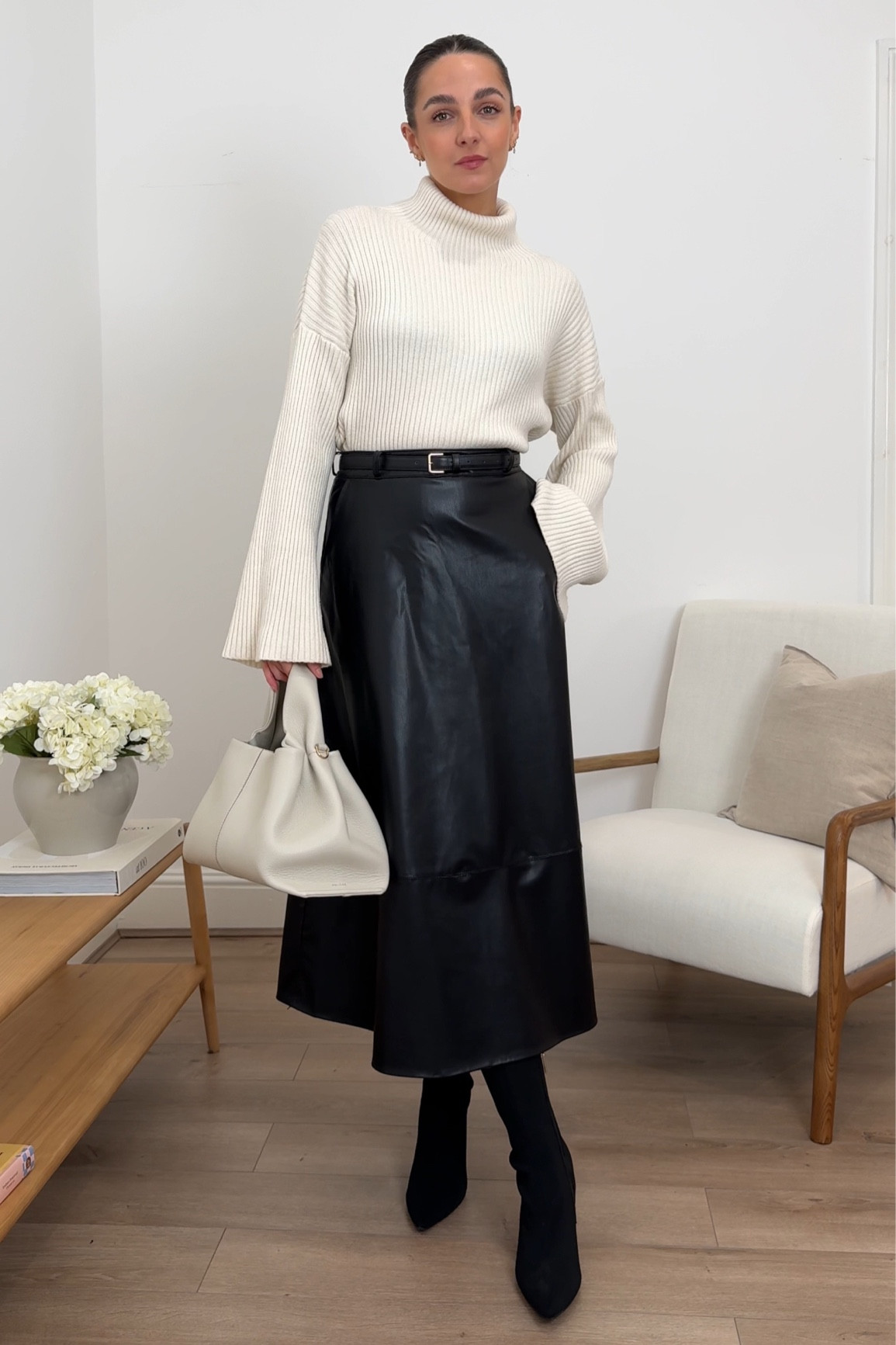 Winter workwear outfit, office outfit, faux leather skirt, midi skirt, chic outfit, black skirt, cream jumper, white jumper 

#LTKworkwear #LTKstyletip #LTKeurope