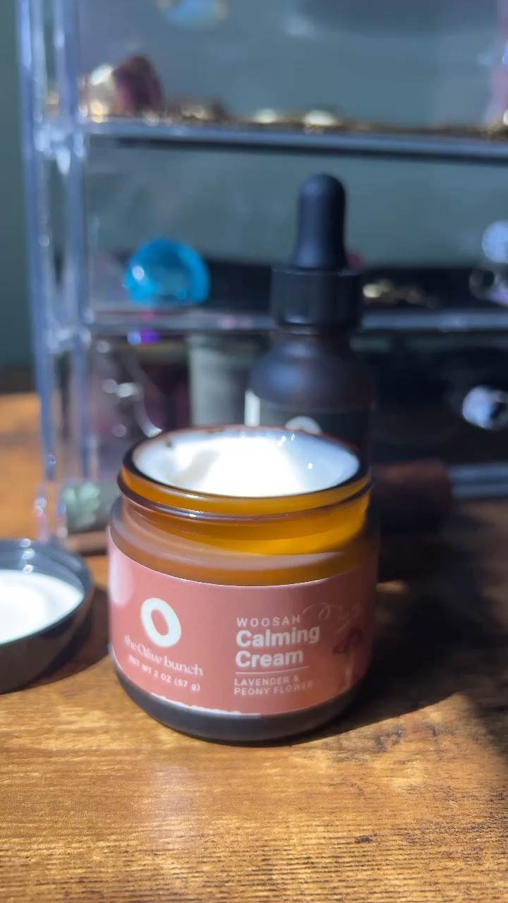Say hello to our lavender queen! 💜 The Woosah Calming Cream ✨ If you’re looking for a luxurious way to end your nightly skincare routines, look no further. Say hello to the Woosah Calming Cream.

KEY BENEFITS
Improves skin’s appearance of elasticity & firmness

Soothes and nourishes skin with natural floral extracts

Reduces the appearance of dark spots for an even tone

Nighttime moisturizers are taking over the marketplace and redefining the meaning of beauty sleep. This lightweight smoothing cream visibly rejuvenates skin texture, nourishing the skin with the abundance of vitamins.

The luxurious cream not only visibly improves the appearance of skin texture, but also helps even tone. Paeonia Flower cleanses for a radiant and dewy glow.

Enriched with our exclusive natural lavender scent, this cream enhances the skin’s ability to recharge during the nightly resting process.

SCENT STRENGTH
Scent: Calming Lavender

Strength: Med-High

WEIGHT
2 oz

#woosah #woosa #calmingcream #calmcream #skincarerountines #skincareroutine #skincareroutinetips #nighttimeroutine #nighttimeskincare #endofday #blackownedboutique #blackownedbiz #lavenderfields #lavenderoil #lavenderessentialoil #lavenderflowers #lavenderskincare #soothingskincare #soothingsounds #soothingcream

#LTKFindsUnder100 #LTKSaleAlert #LTKFindsUnder50