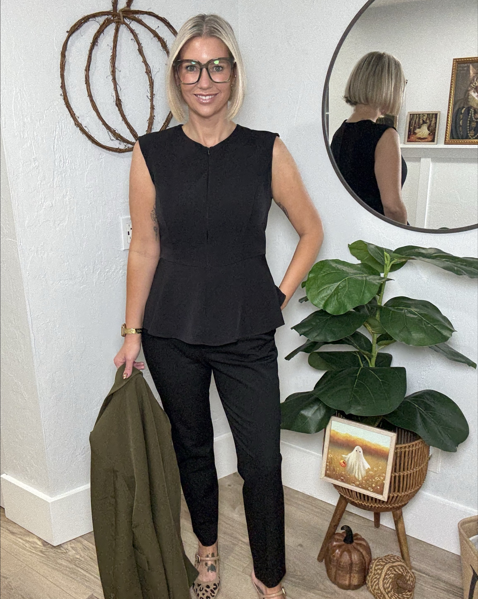 I love an all black outfit! It’s so chic!! 

Peplum tops are back and all the rage! This top is from Target. I’m wearing a medium. The zipper up the front adds a fun touch. 

These trousers are from Express. I grabbed them off Poshmark but I’ll link up some similar options. 

My heels are from CosyIsland. 

My Olive Blazer is from the Scoop Brand found at Walmart. I’m wearing a small. The buttons at the wrist are functional. 

Workwear, office style, business casual, work attire, 

#LTKOver40 #LTKStyleTip #LTKWorkwear