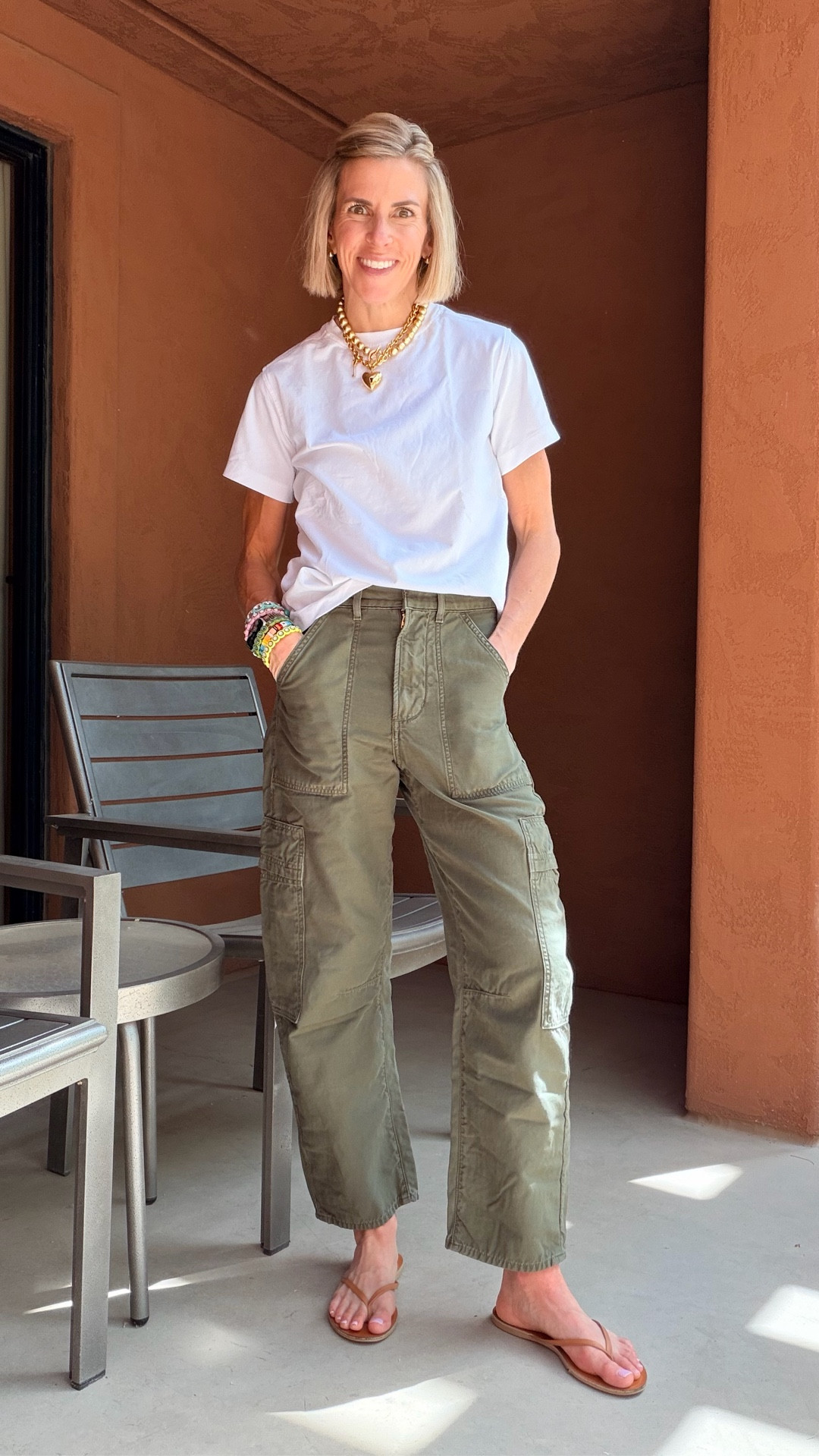 This little gem never made it out of my camera roll last week!?  Too good not to share as I am wearing this look on repeat. 💥🍒 

White T, cargos and flips….doesn’t get easier. Dressed it up with some gold jewels and off we go!  Also linked my favorite luggage 🧳

#LTKgrwm #LTKootd #LTKTravel