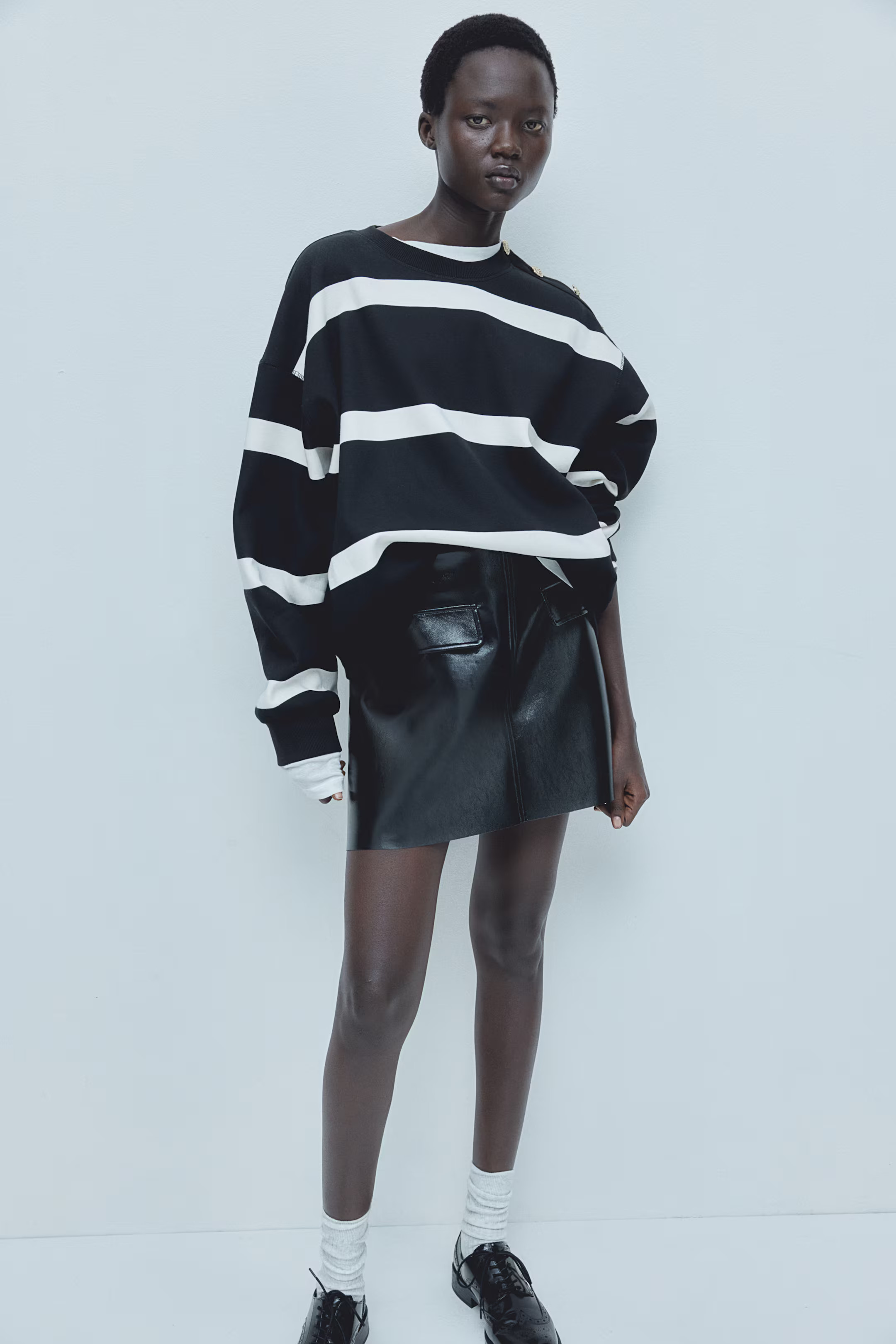 Coated mini skirt - High waist - Short - Black - Ladies | H&M GB | H&M (UK, MY, IN, SG, PH, TW, HK)