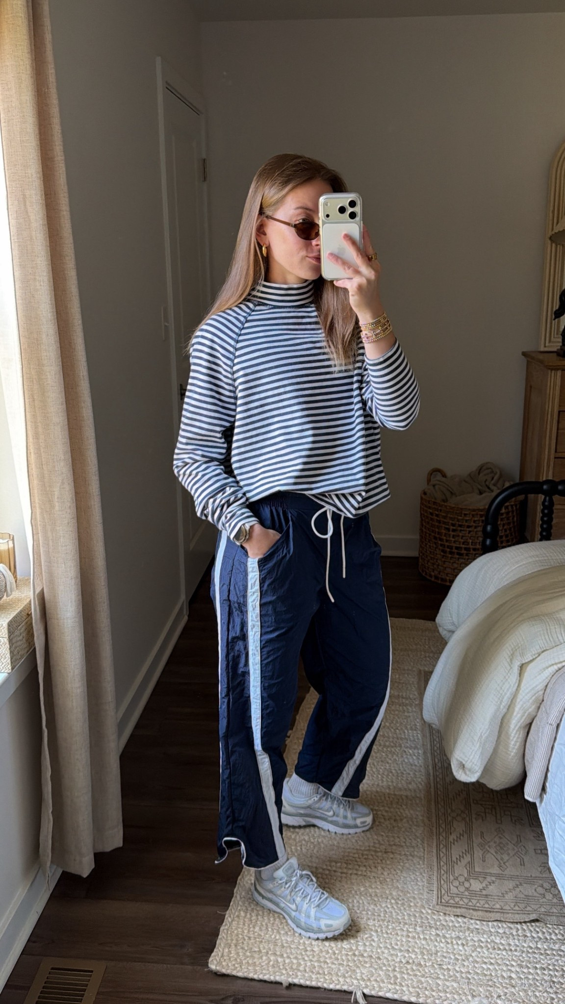 4/12/26 Casual Walk Outfit

My go-to outfit for a chill morning walk 🤍

Wearing an easy FP Movement look — lightweight track pants with a striped turtleneck pullover (perfect for those cooler mornings). Paired with my Nike sneakers, Aritzia socks, and my everyday Amazon sunglasses.

Comfortable, effortless, and perfect for getting outside ✨

#LTKootd #LTKActive #LTKfitnessgoals