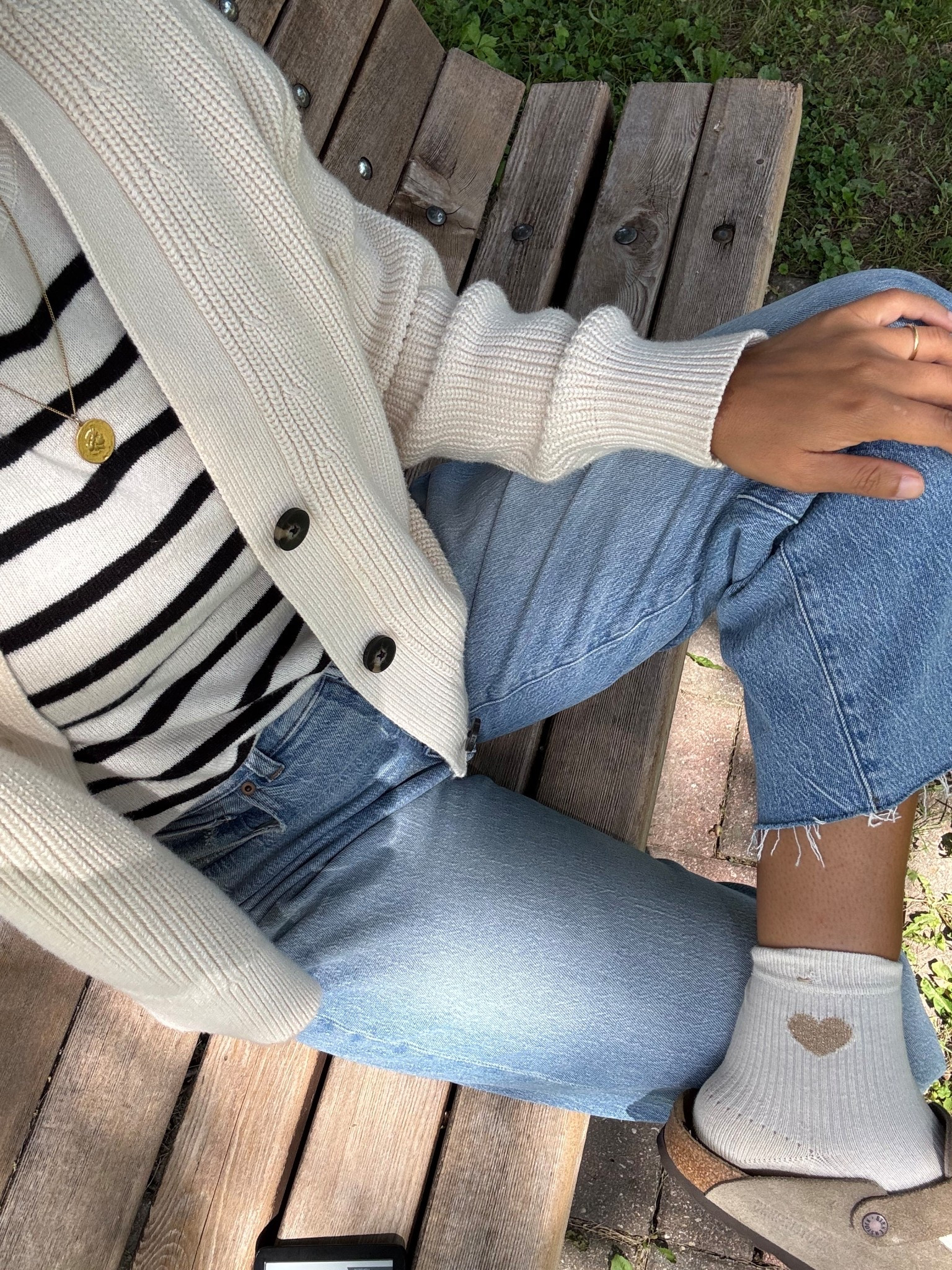 Cute and cozy early fall clogs outfit: striped sweater, jeans, clogs, socks, coin necklace, and cardigan 

#LTKSeasonal #LTKStyleTip