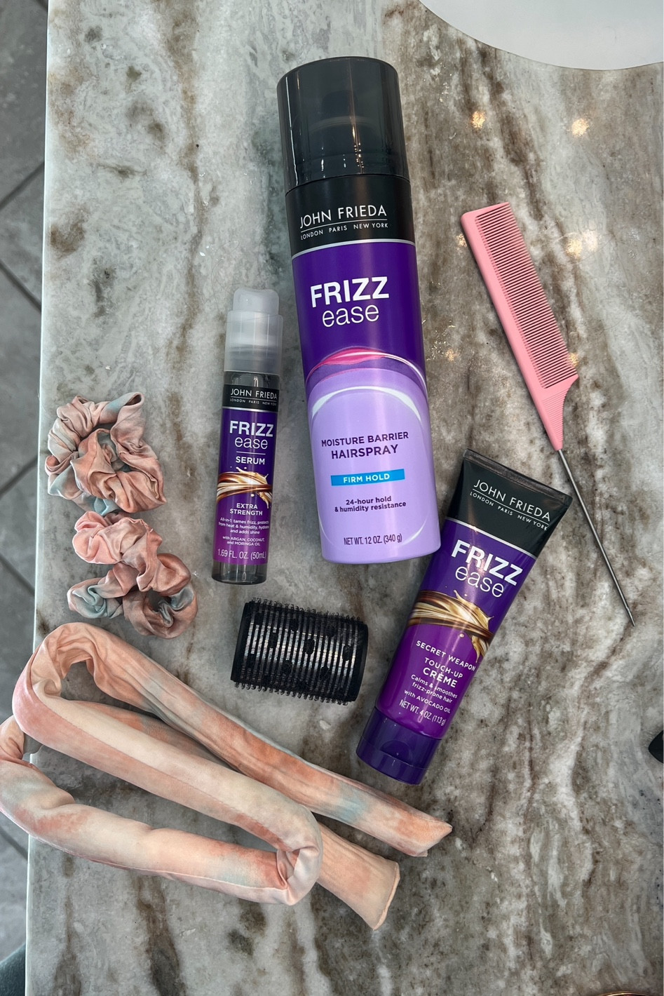 Adding a hair serum is a game changer for heatless curls to help with frizzies or frizzy ends! Use a hairspray if your hair loses the curl quickly - this one adds crazy volume and prevents frizz. I love it. For weird flywayways or frizz use the touch up crème. Great for summer! 

#sponsored
@johnfriedaus 
@cvshealth 
#JohnFrieda
#BeautyUnaltered


#LTKunder50 #LTKbeauty #LTKGiftGuide