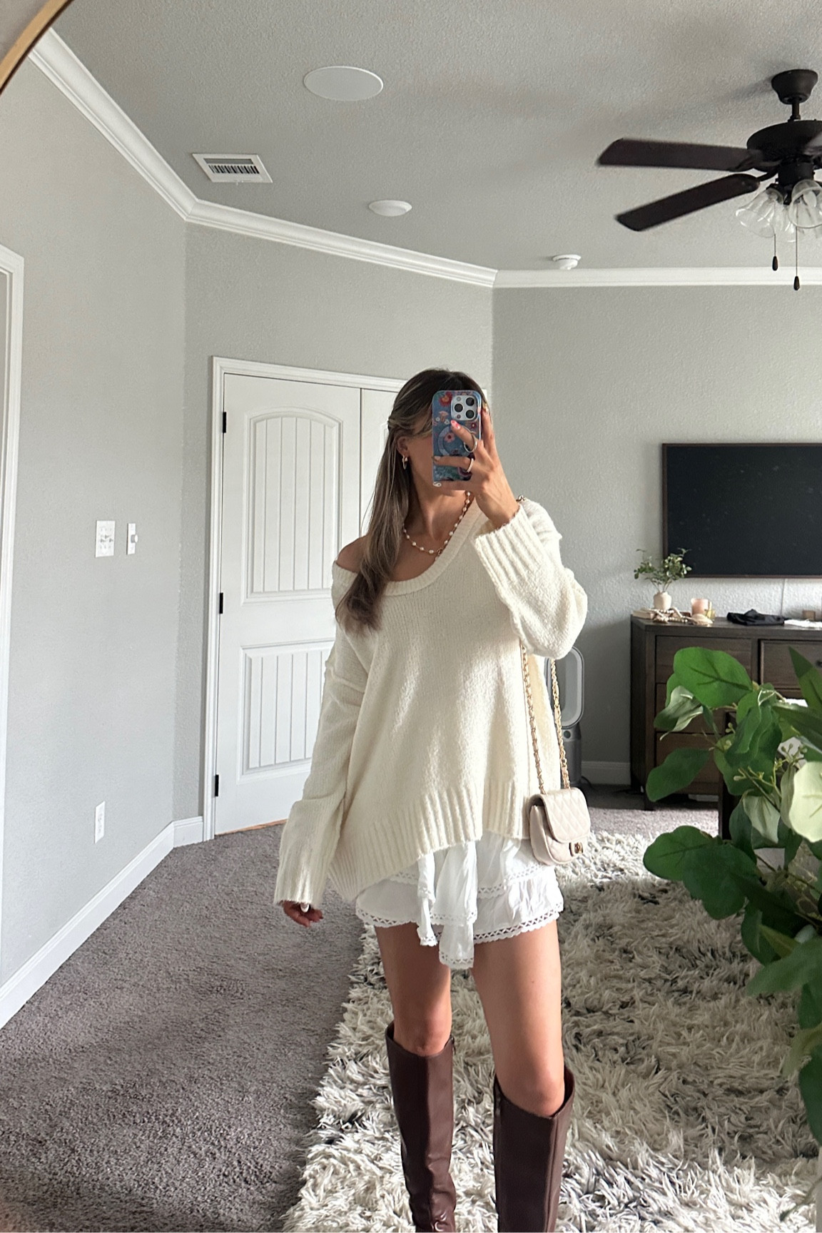 full amazon outfit! wearing my usual size small in this adorable ruffle skort!! sweater is a medium, but i could have stuck with my usual size small since it’s already oversized! boots run true to size!

#LTKStyleTip #LTKFindsUnder50 #LTKFindsUnder100