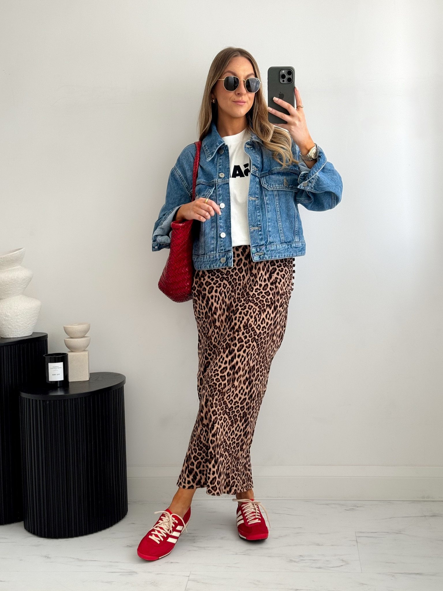 Denim jacket outfit idea with a leopard print skirt & pops of red accessories❤️

#LTKsummer #LTKstyletip #LTKspring