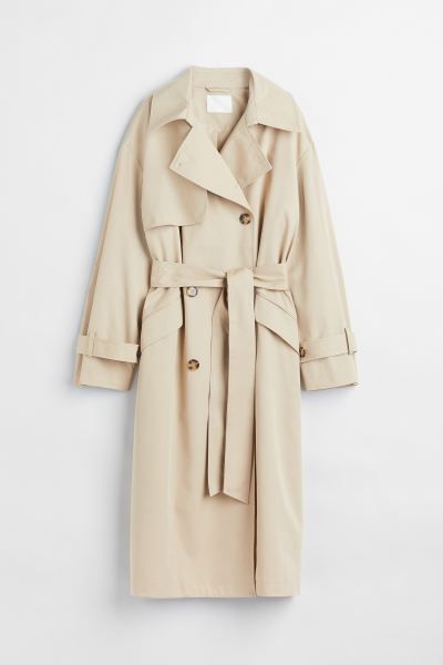 Calf-length, double-breasted trench coat in woven cotton fabric. Collar, storm flap with button, ... | H&M (US + CA)