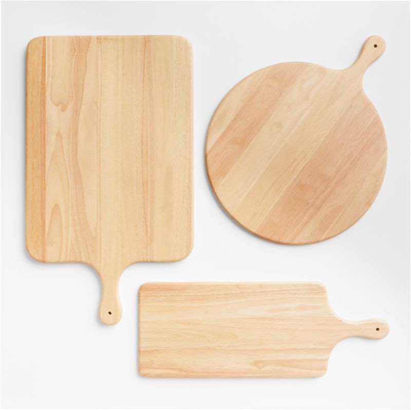 Tondo Natural Wood Serving Boards with Handles | Crate & Barrel | Crate & Barrel