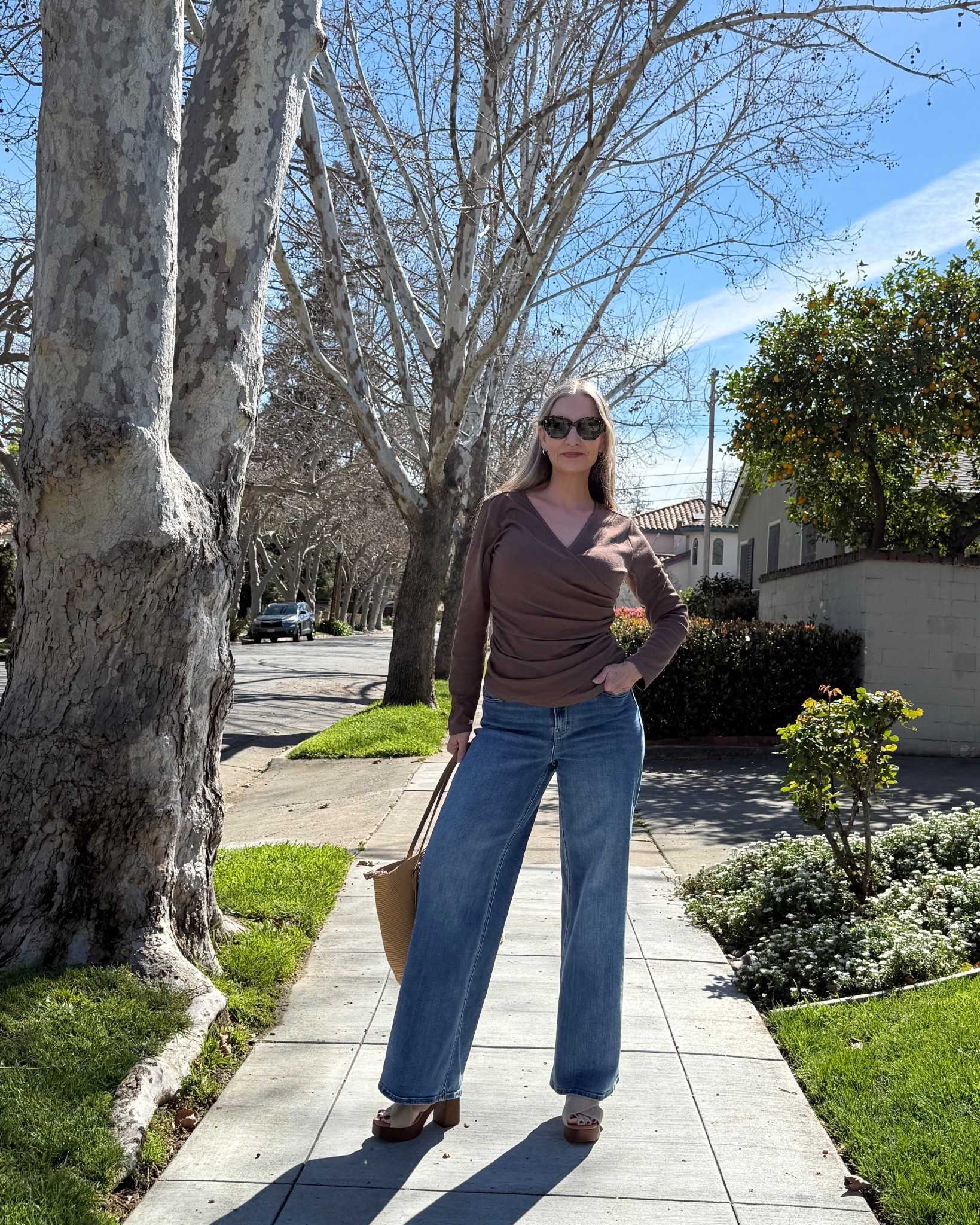 Flattering wrap top - #amazonfind - pretty ruching, snap closure, variety of colors available & wide leg stretch jeans - both true to size.

#LTKUnder25 #midsizestyle #pearshapedstyle #wraptop #coffeebrown #coolsandals

#LTKMidsize #LTKOver40 #LTKootd