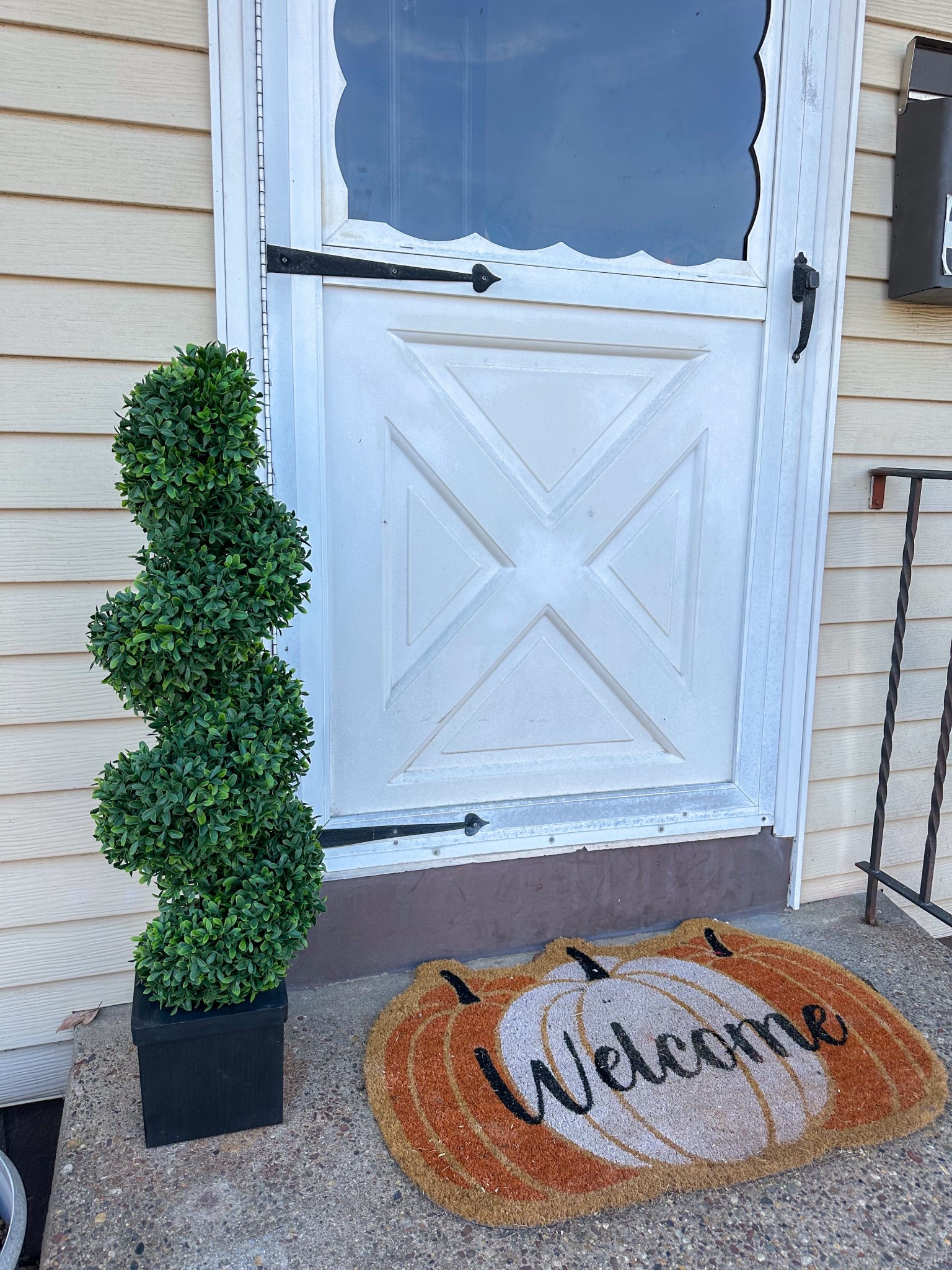 Just got the cutest spiral boxwood for our front porch.  Ignore my pumpkin welcome mat, also just bought a new mat that I will link.  Mock up photo coming shortlyy

#LTKHome